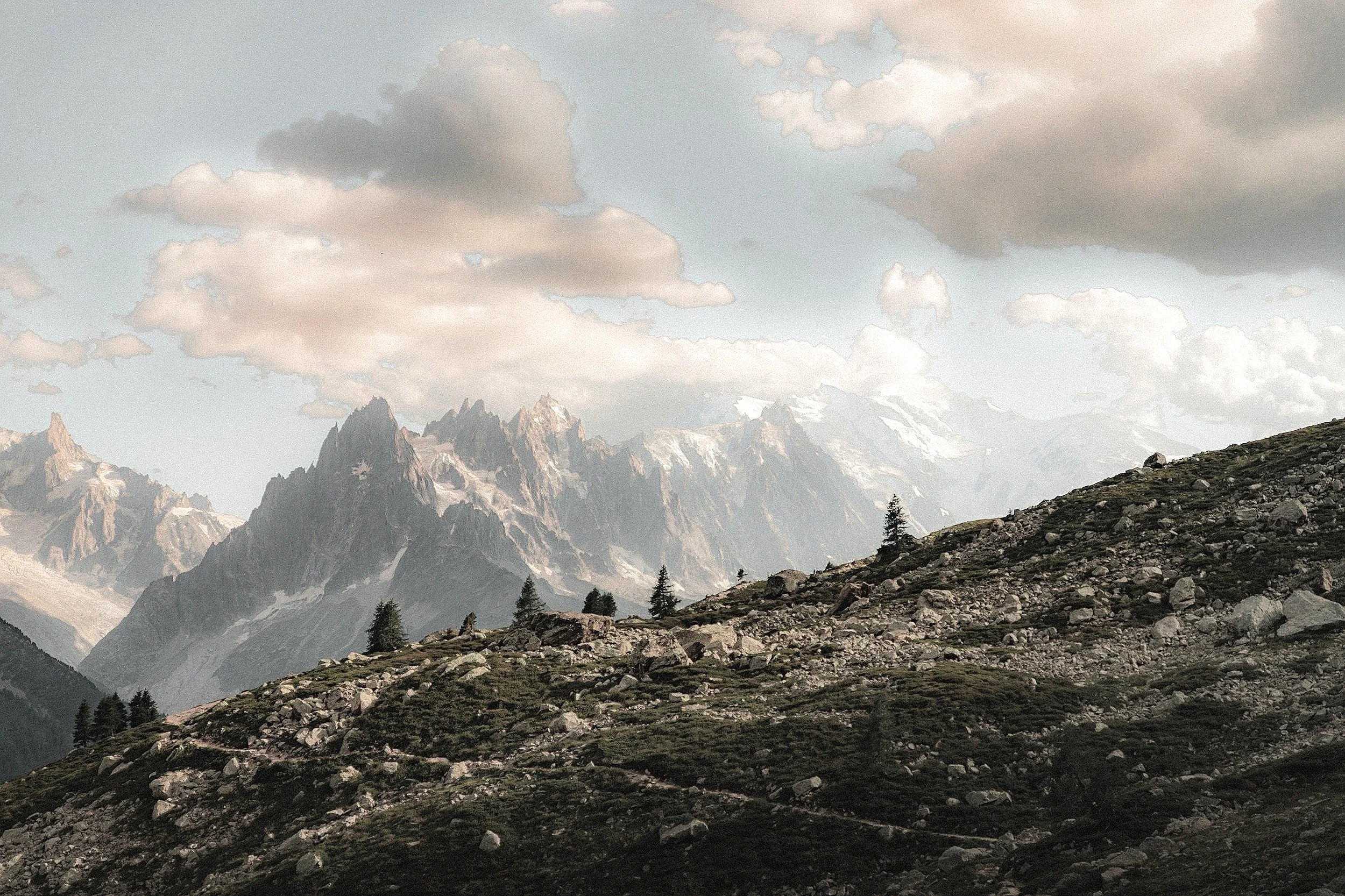 Mountains inspire executive coaching rocks, clouds and connection for teams and organizations