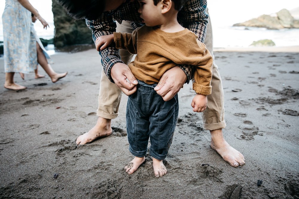 family photography session for family of four at Rodeo Beach, Ma