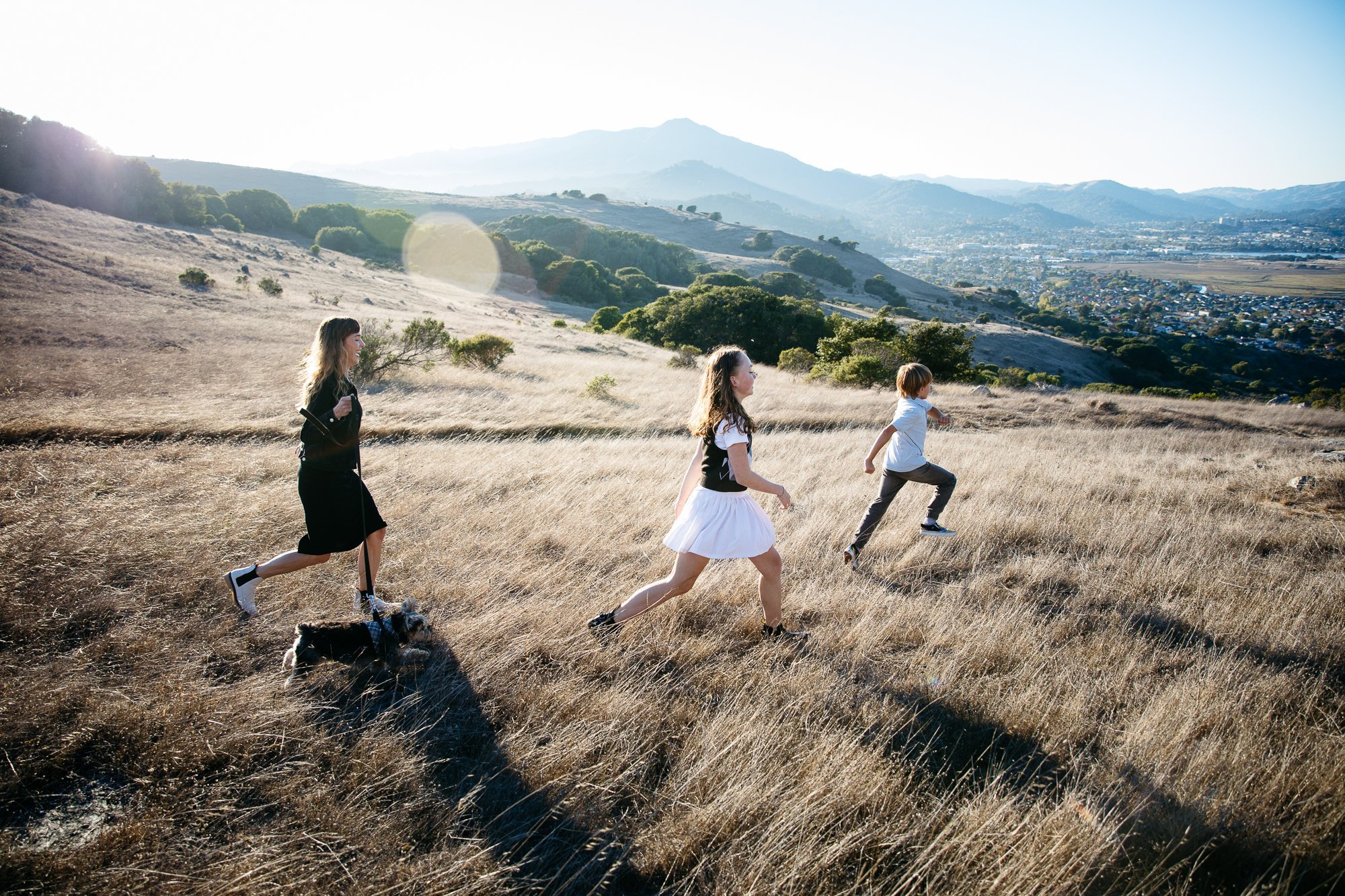 family photography session for family of three at sunset, Ring M