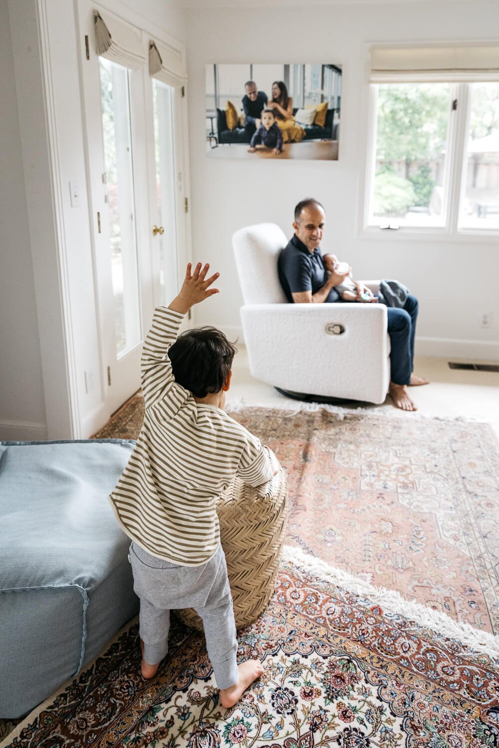 In home newborn lifestyle photo shoot with toddler older sibling 