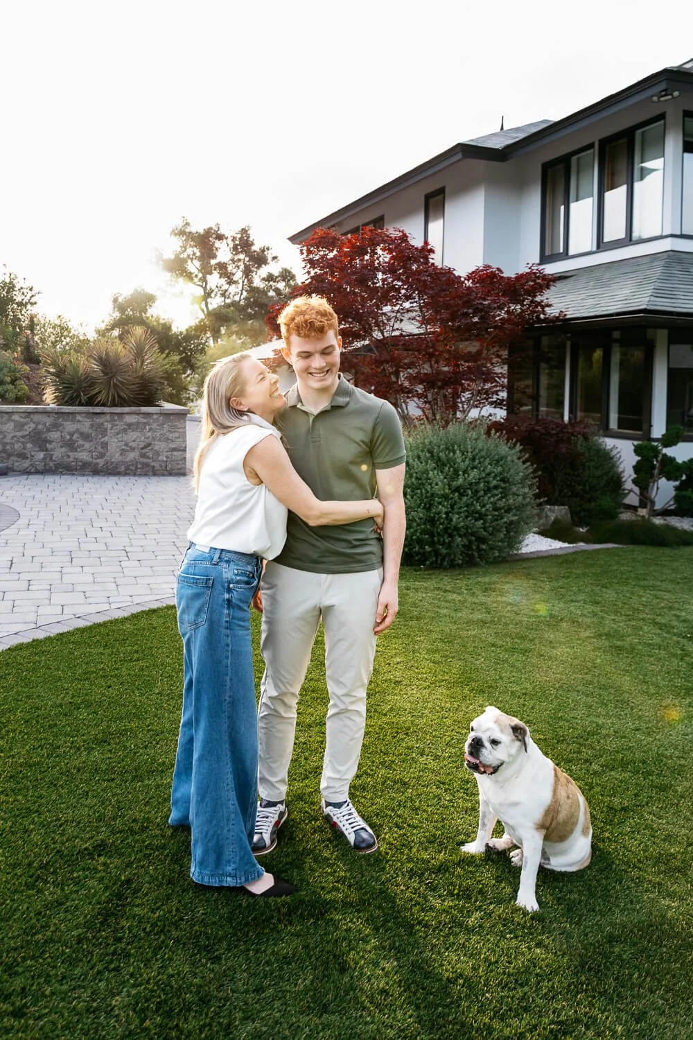 Senior portrait of teen boy with his mom in their backyard in Orinda, CA.