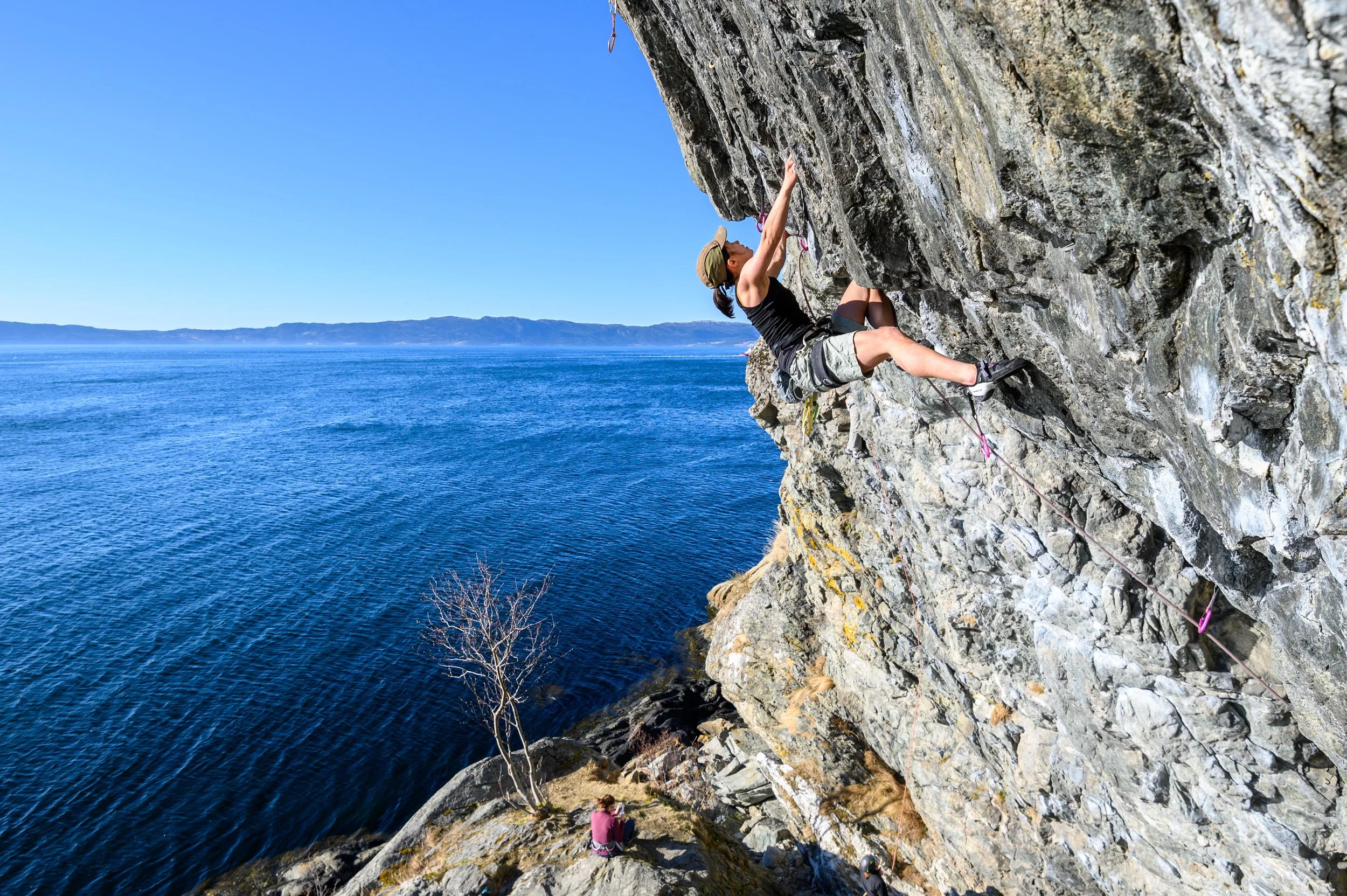 Anna Zhang on Skyggelua (7b+) at Korsvika, Trondheim, Norway.
