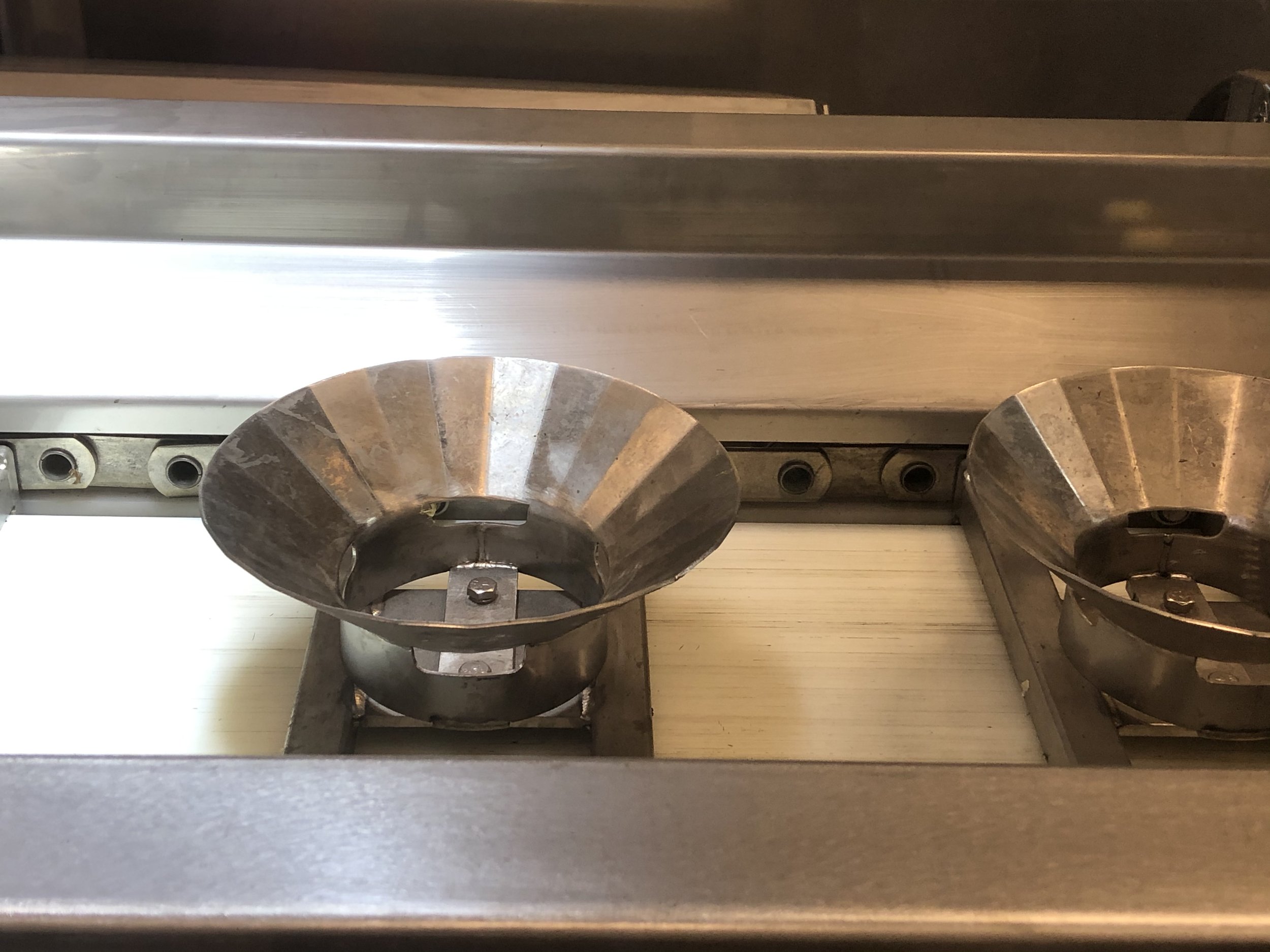 Extractacore cup conveyor
