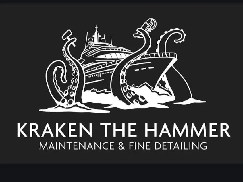 Logo for Kraken the Hammer, a boat maintenance and fine detailing service, featuring a large ship with two kraken tentacles emerging from the water.