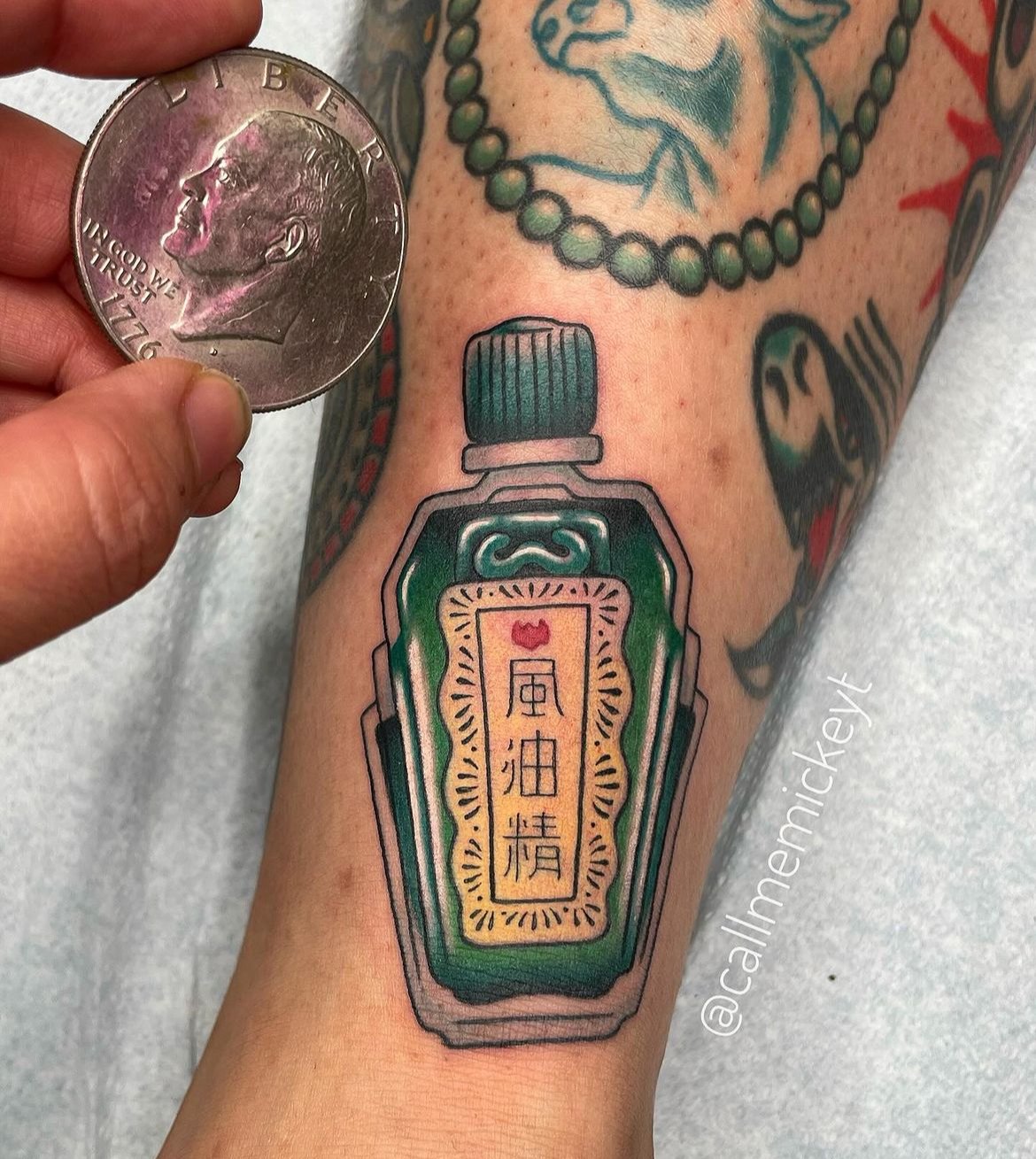 Green oil Vietnamese Asian tattoo