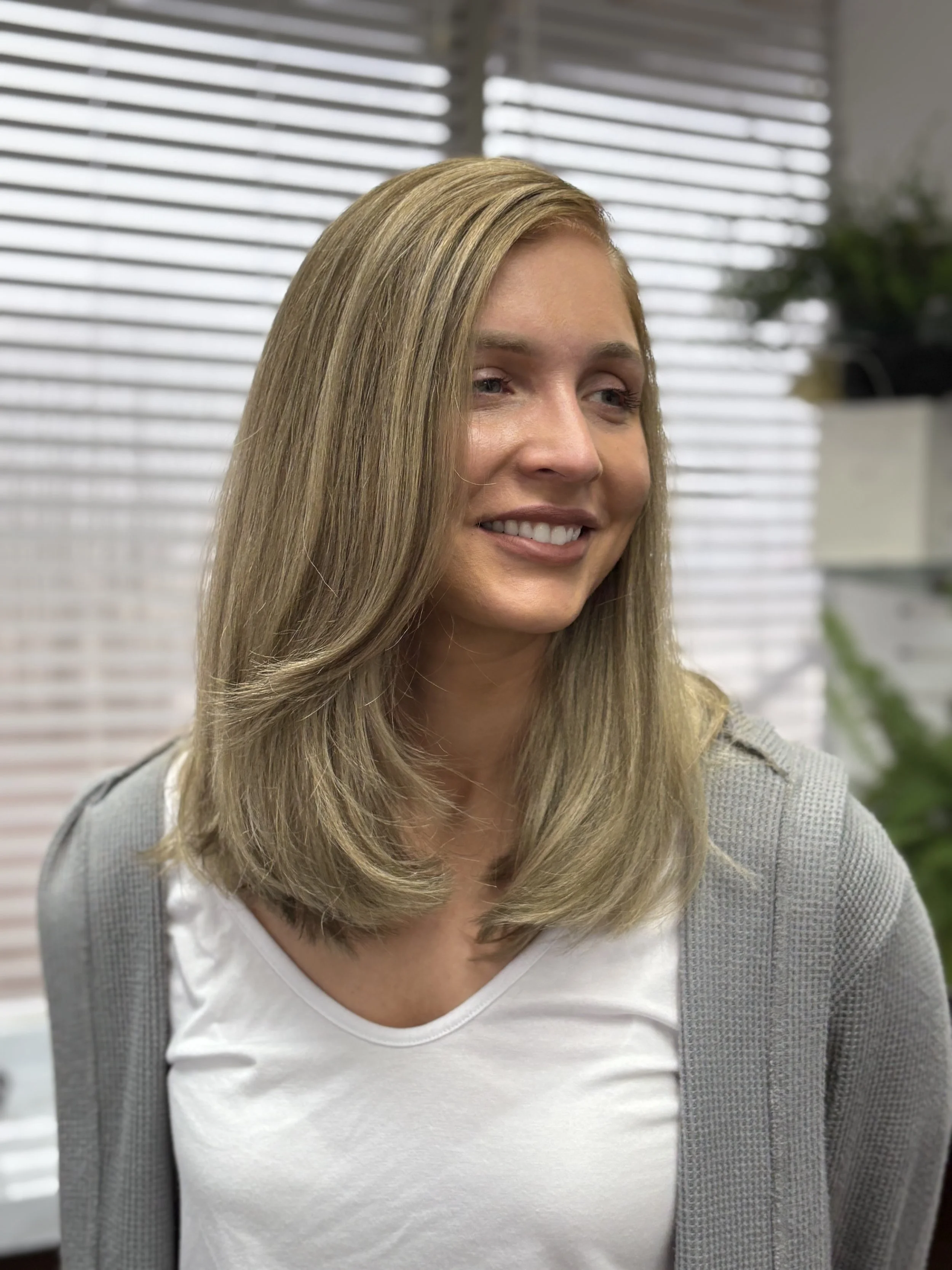 Wanting to make a big change? Jenna specializes in color transformations big or small. Like taking this platinum blonde down to a gorgeous natural blonde for lower maintenance.