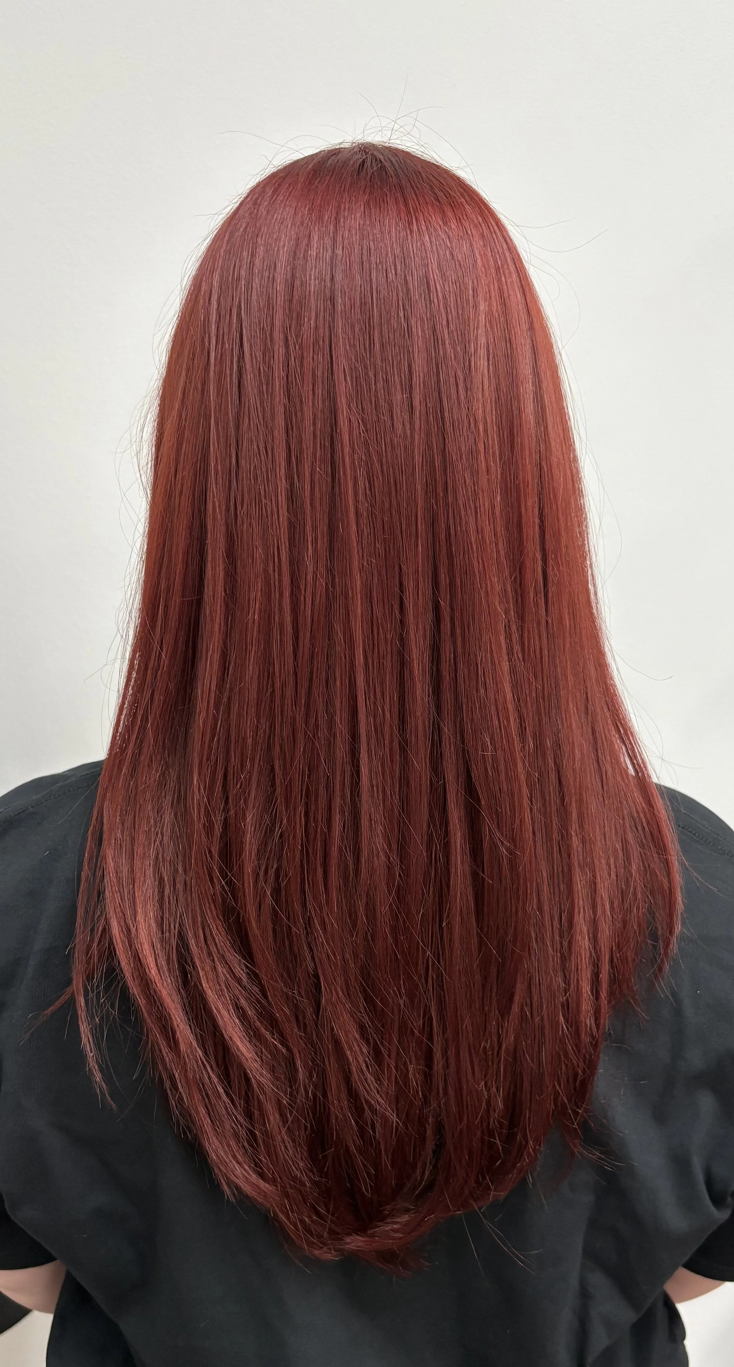 Dark reds can be tricky, Jenna is an expert in every shade of red. So much so she has taught her signature class entirely on red hair all over the world! 