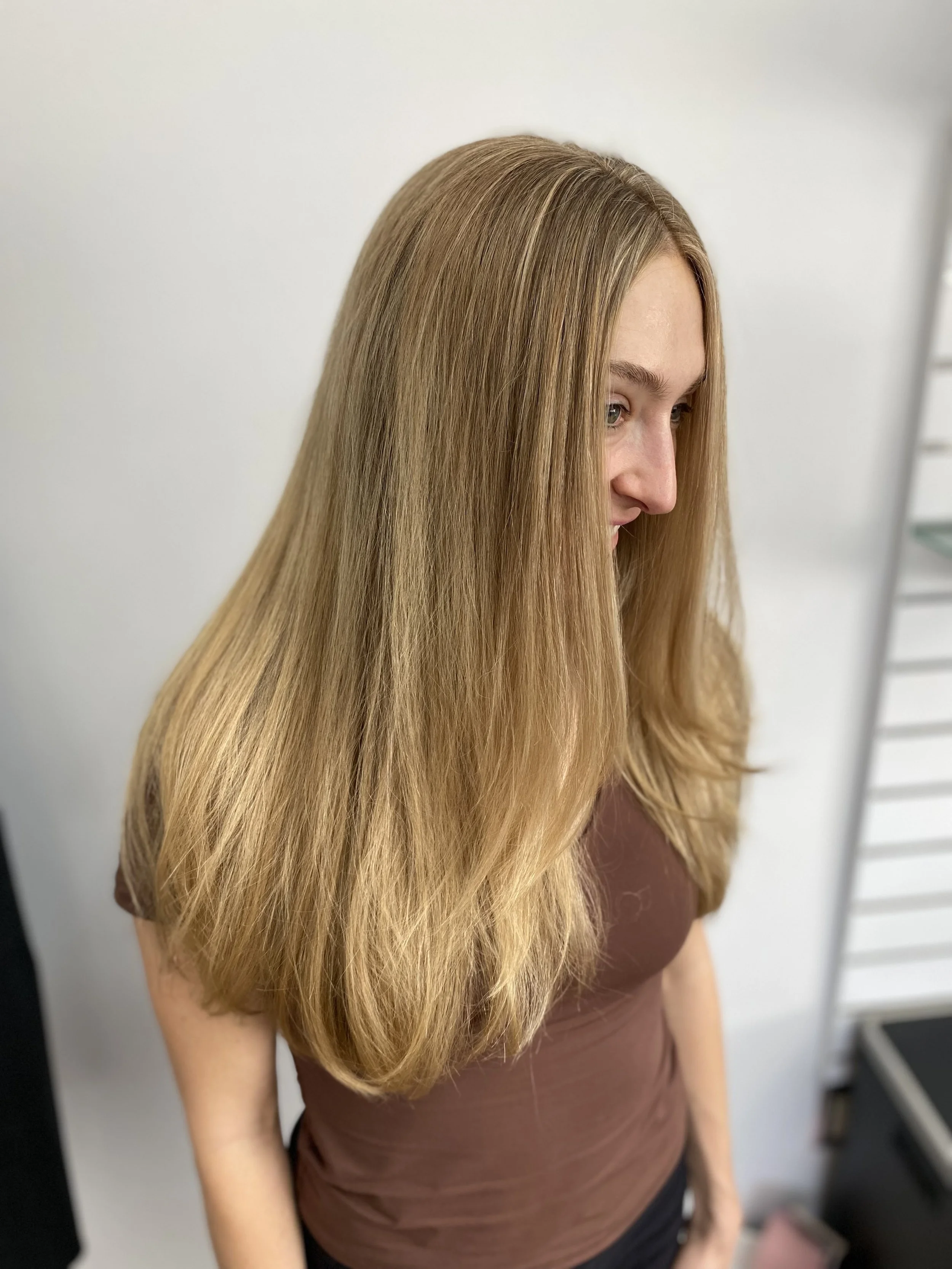 Gorgeous natural golden blonde is a big request at The Salon Austin. Many people do not realize that warmer colors suit them, and at the Salon Austin we gently guide you in the direction of your color palette so you always look and feel your very bes