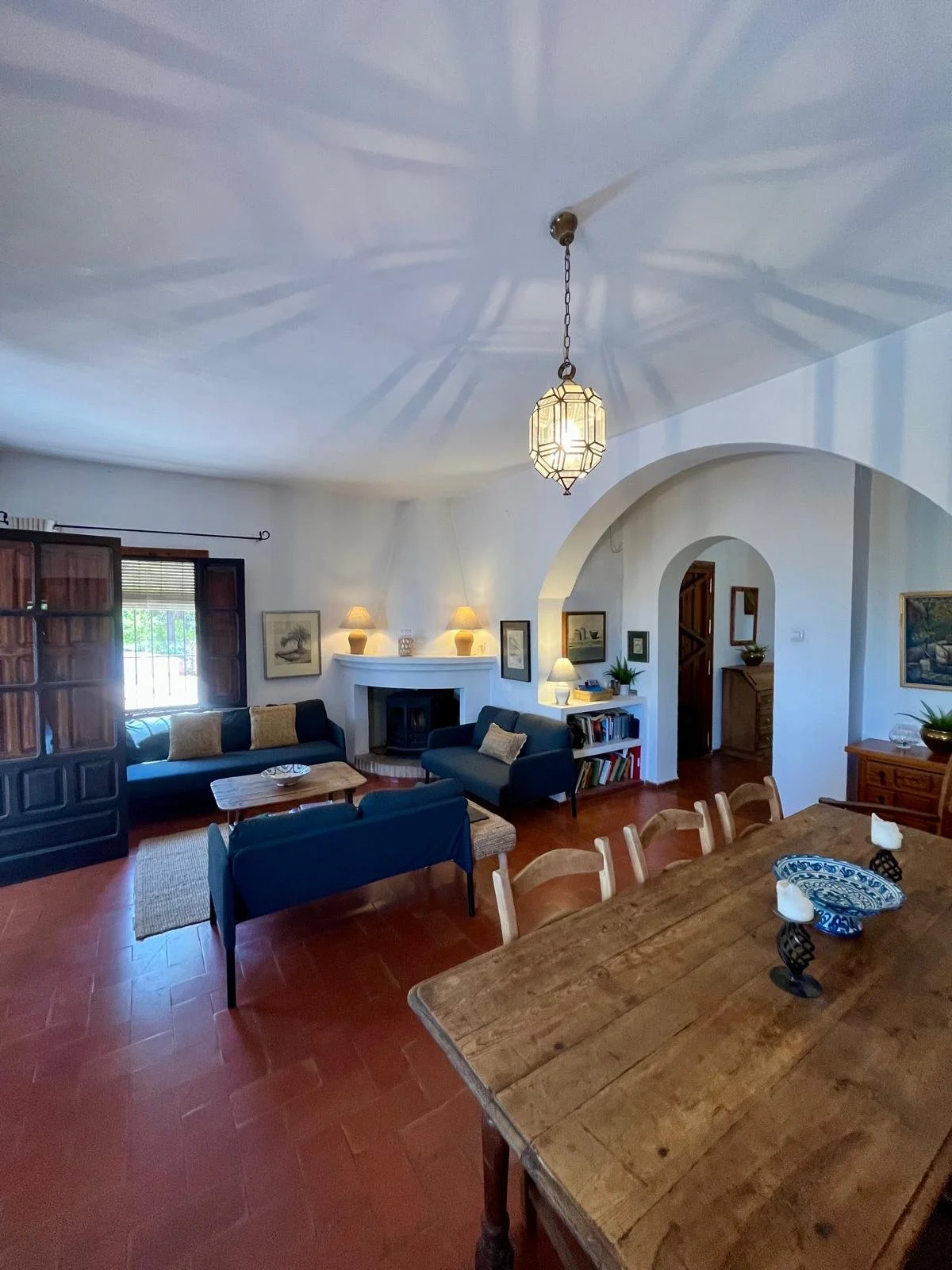 Traditionally styled and tiled interior with woodburning stove, local art and antiques. Discreet Smart TV and DVD player.
