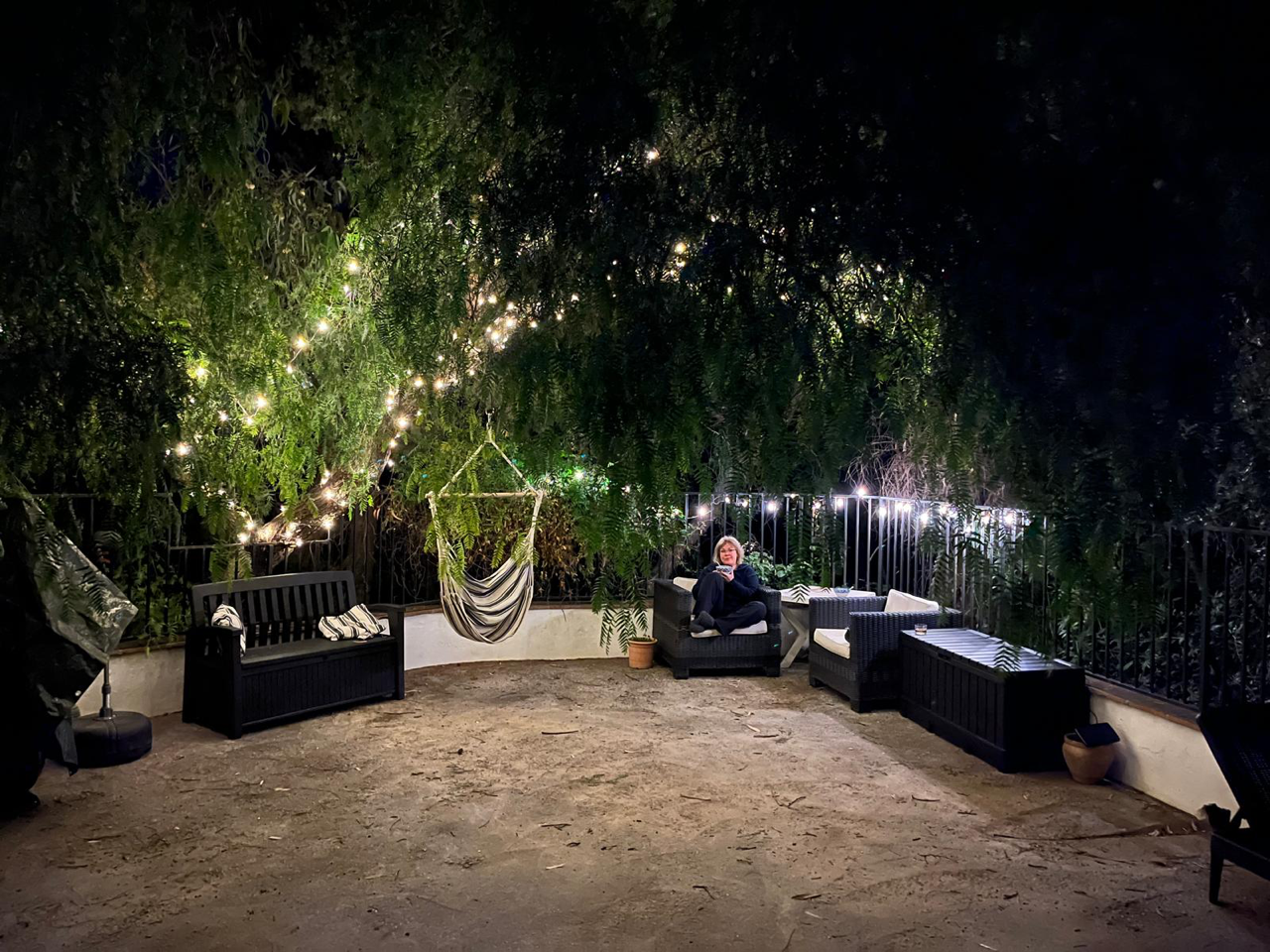 There are some new seats to literally hang out in under the twinkly peppercorn tree....and some yoga mats and exercise equipment in the storage benches.