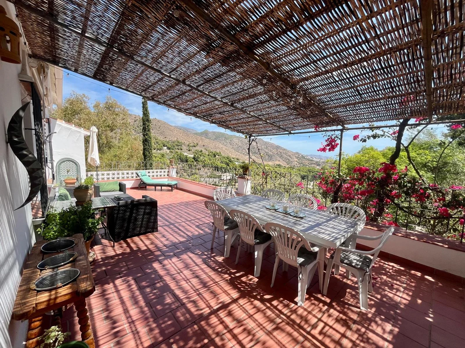 Featuring local sculpture, Moorish fountain and an extractable awning, the main terrace is a beautiful space in which to sit out. Day or....