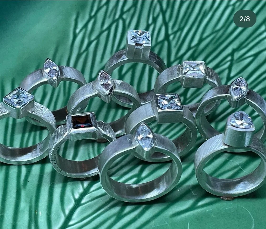 bezel set rings with fancy cut stones