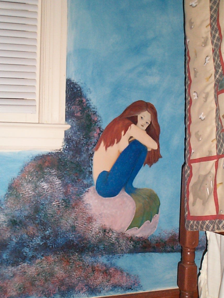 mermaid sitting on a rock - painted by Julie