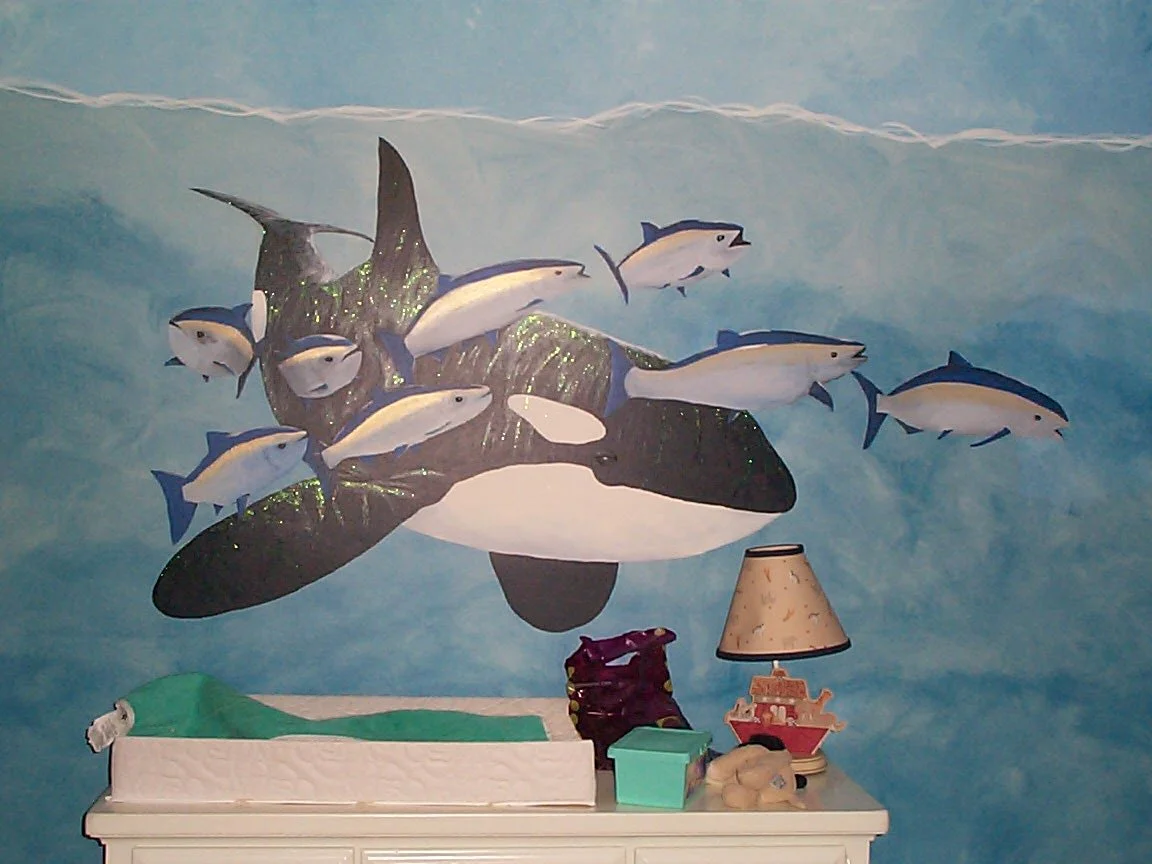 orca close-up, we painted this scene together and used glittery paint for the sunlight reflections coming down through the water on the orca's back