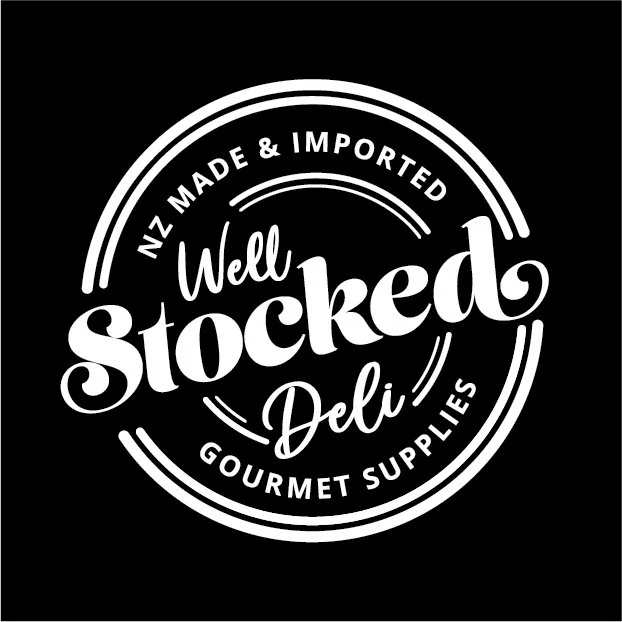 Black circular logo with white text reading "Well Stocked Deli" and phrases "NZ Made & Imported" and "Gourmet Supplies".
