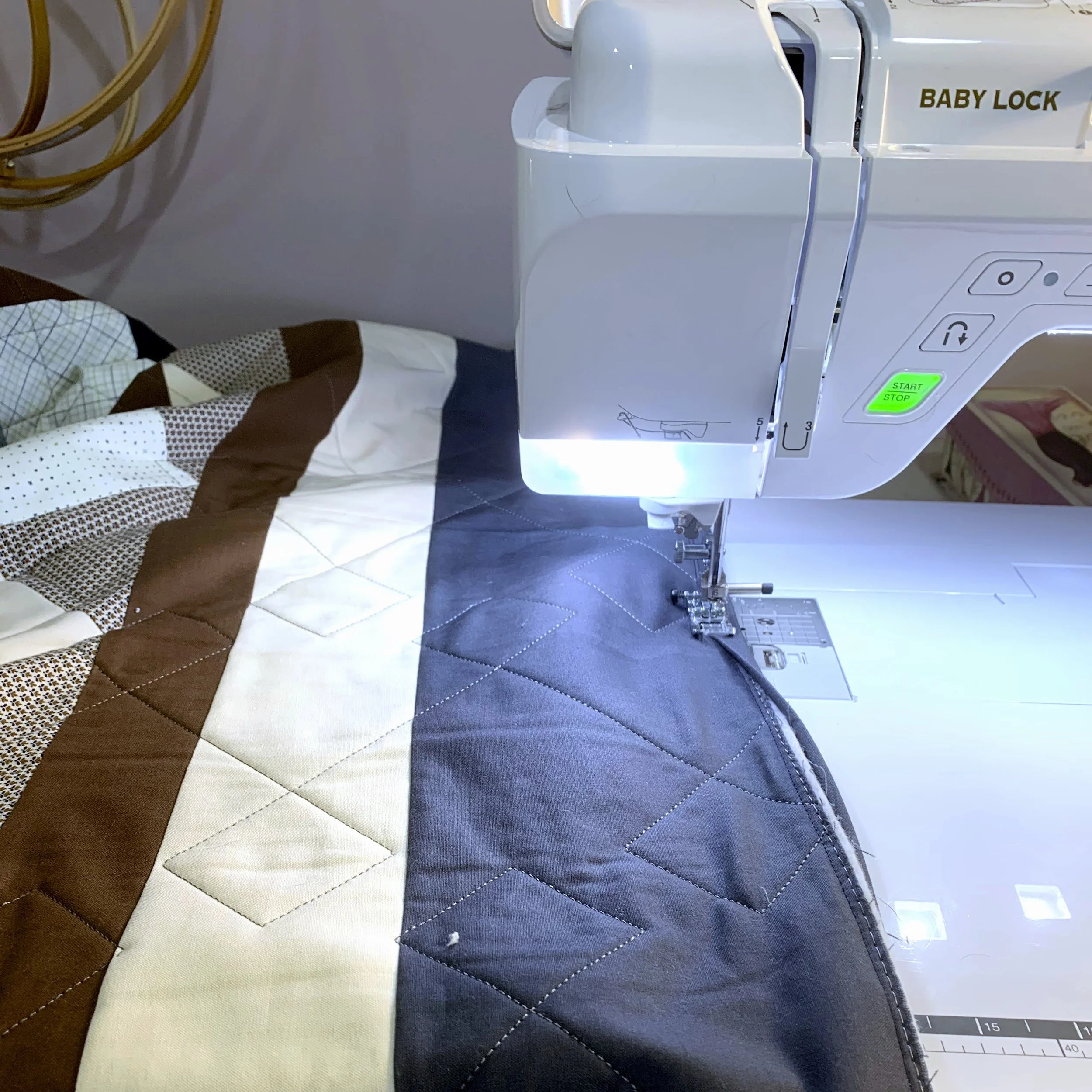 Binding being put on a quilt