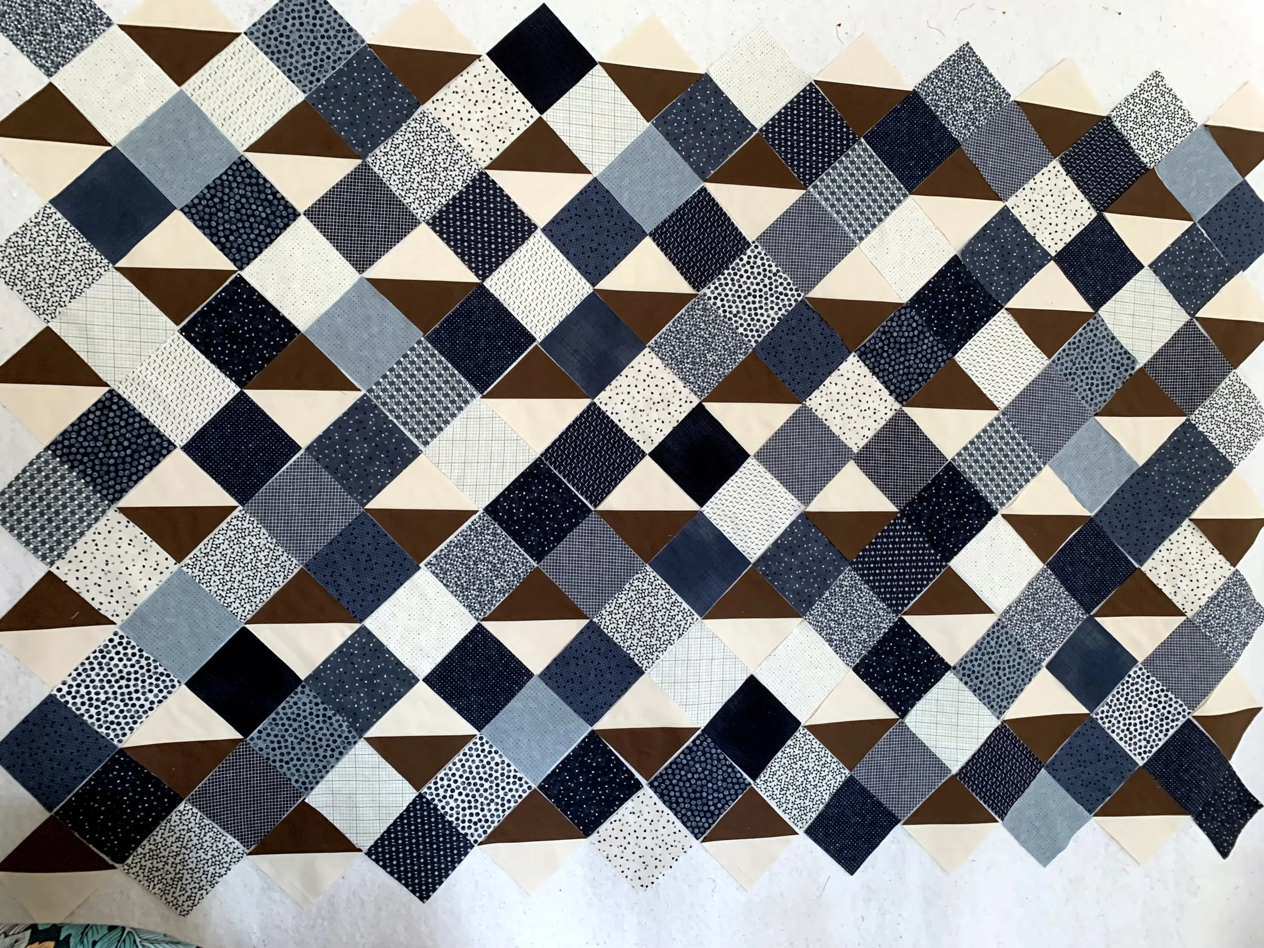 scrappy blue quilt top