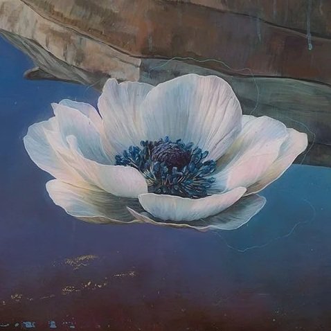 A painted white poppy flower with dark blue center floating on water.