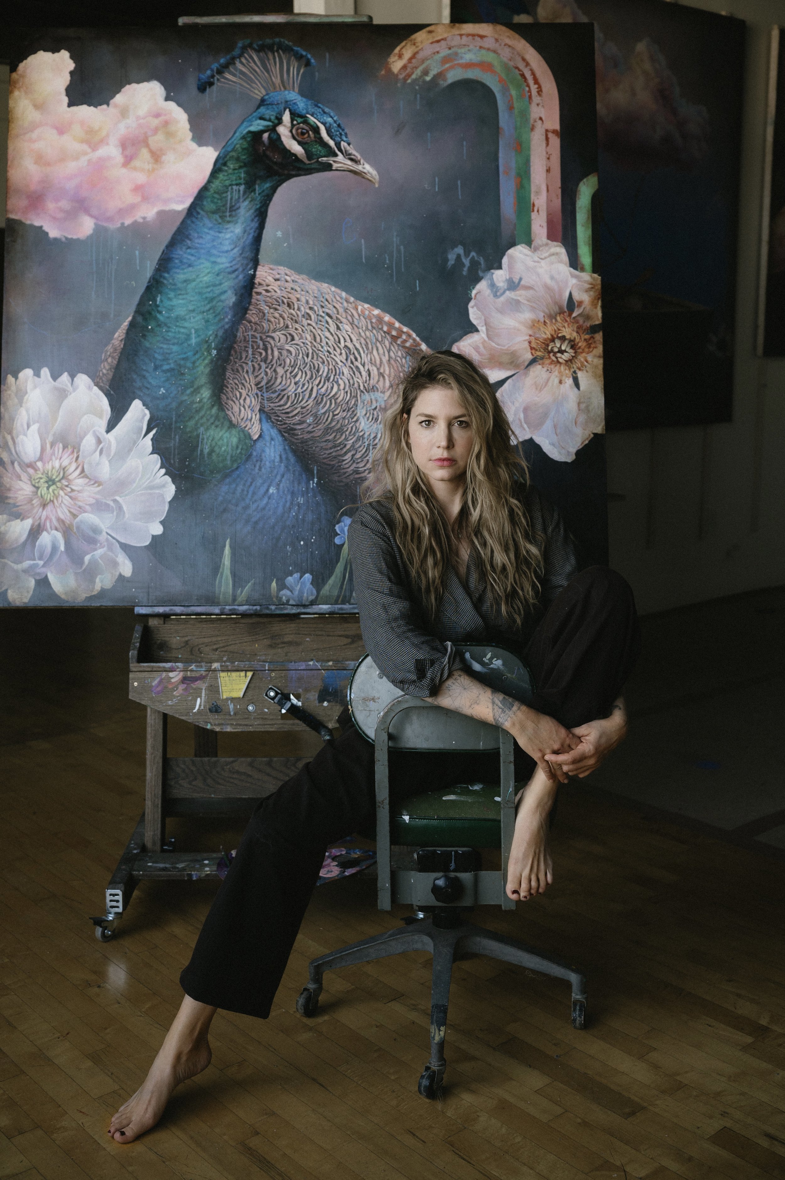 Sarah Helser, contemporary painter, with Last American Beauty in her studio at Dilworth Artisan Station, Charlotte NC — acrylic and mixed media with resin.