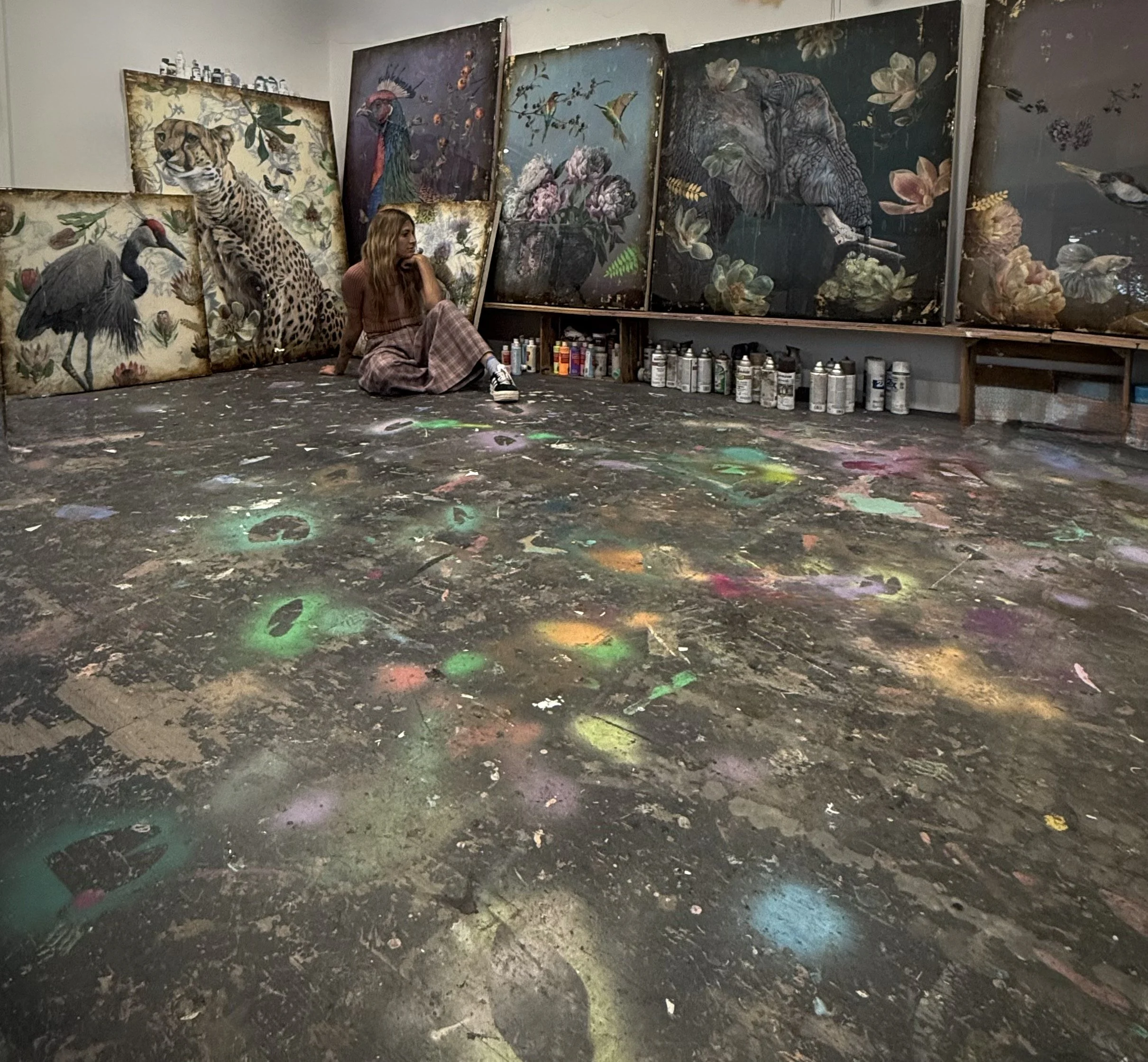 Sarah Helser's home studio in Charlotte NC, with works from an earlier collection — the studio was lost in a fire in October 2025.