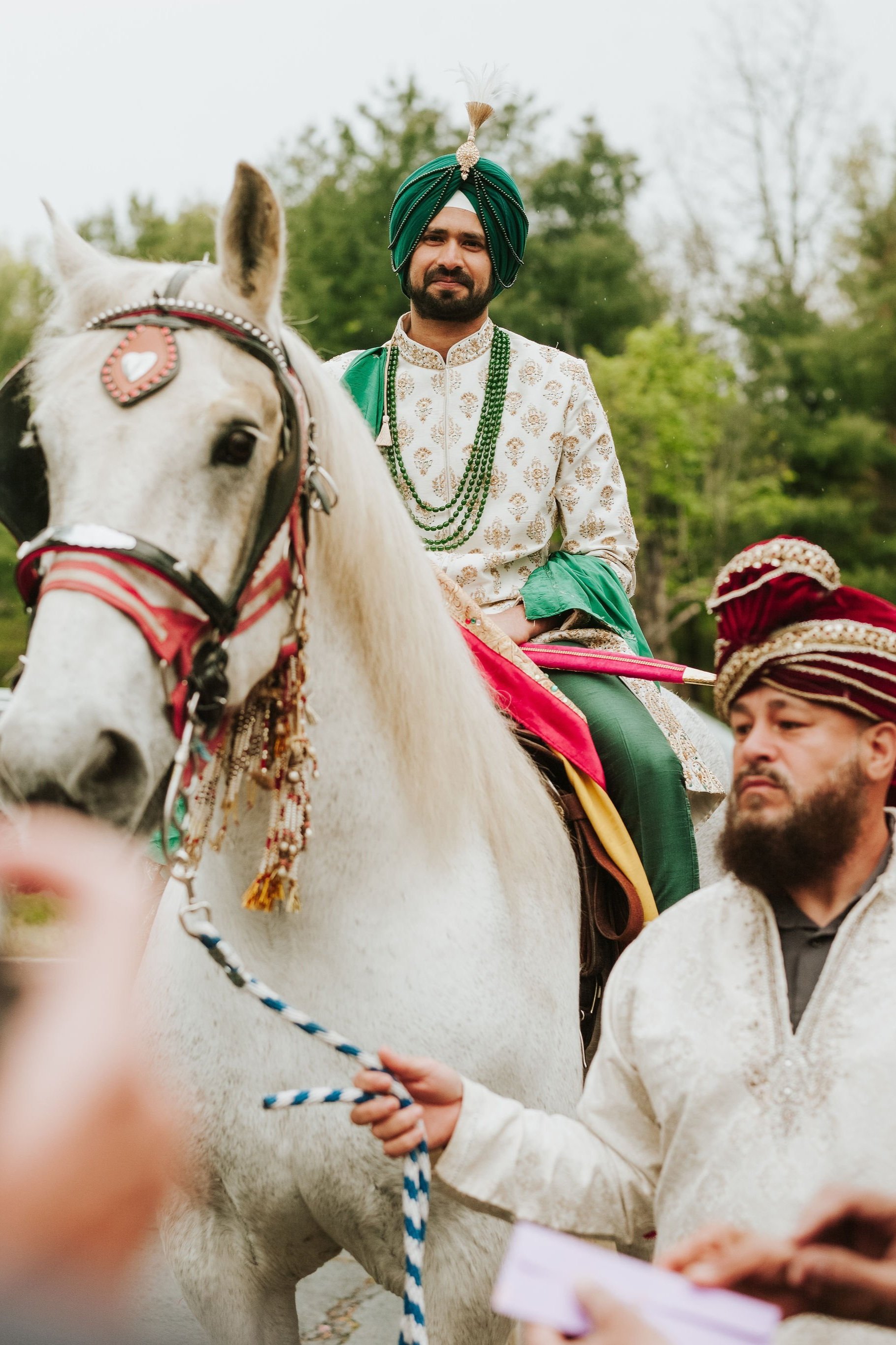 groom-entrance-horse-oheka-castle-wedding.jpg
