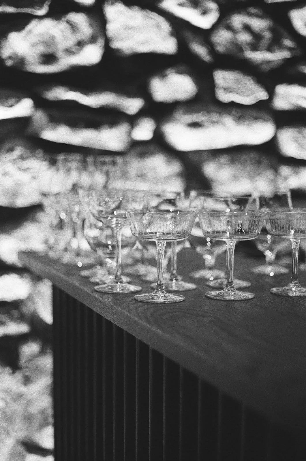 Artistic display of vintage wedding glassware, epitomizing the sophisticated and elegant touch of Ashley Peraino's wedding planning services in NYC.