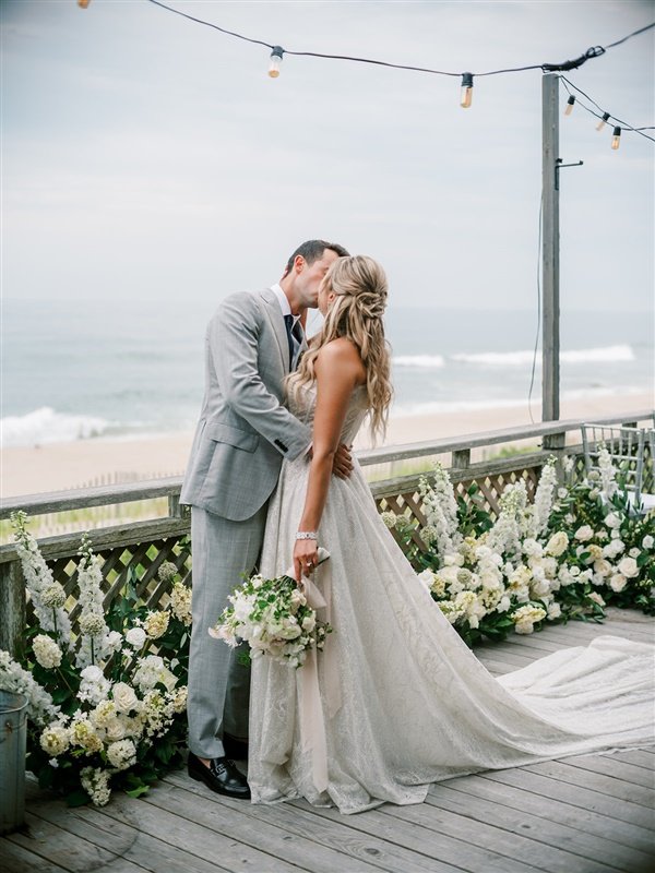 newlyweds-kissing-beach-background-hamptons-11932.jpg