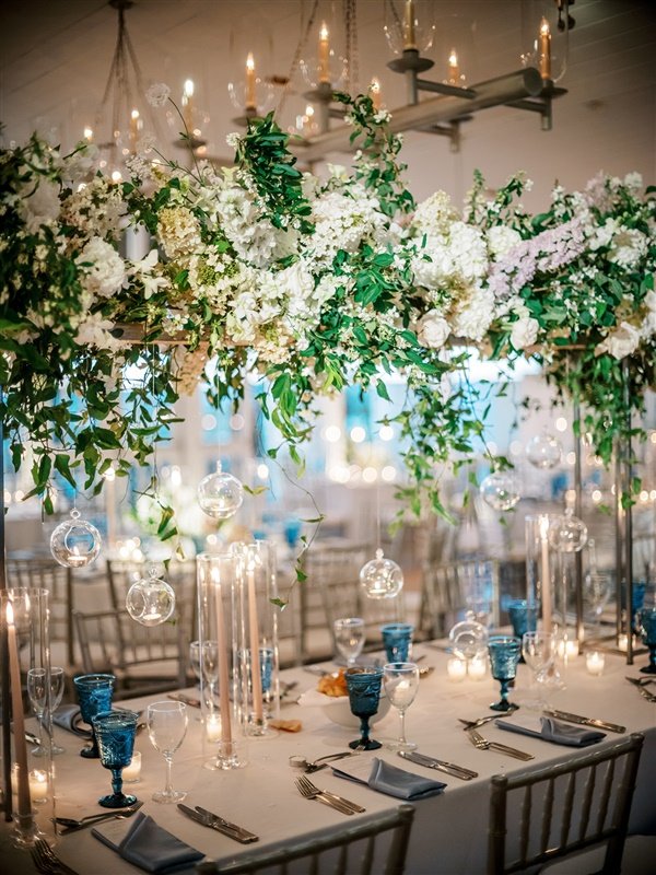 floating-flower-arrangement-table-blue-napkins-candles-hamptons.jpg