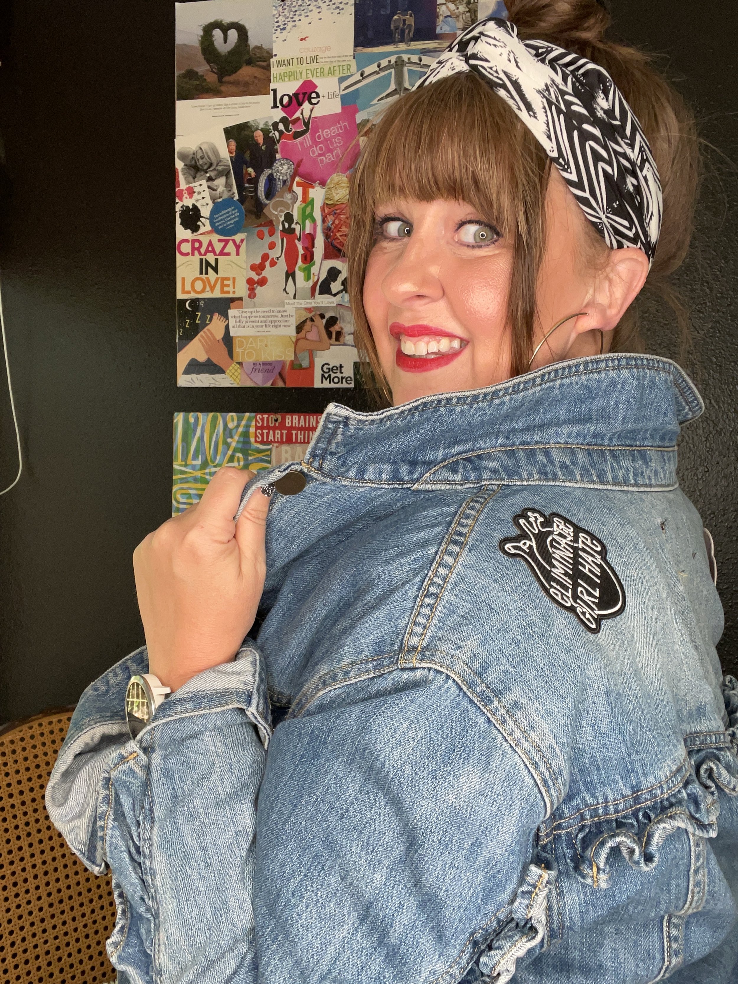Dawne Hanks CEO & Founder of ELIMINATE GIRL HATE wearing the black and white embroidered ELIMINATE GIRL HATE embroidered Iron-On Patch product