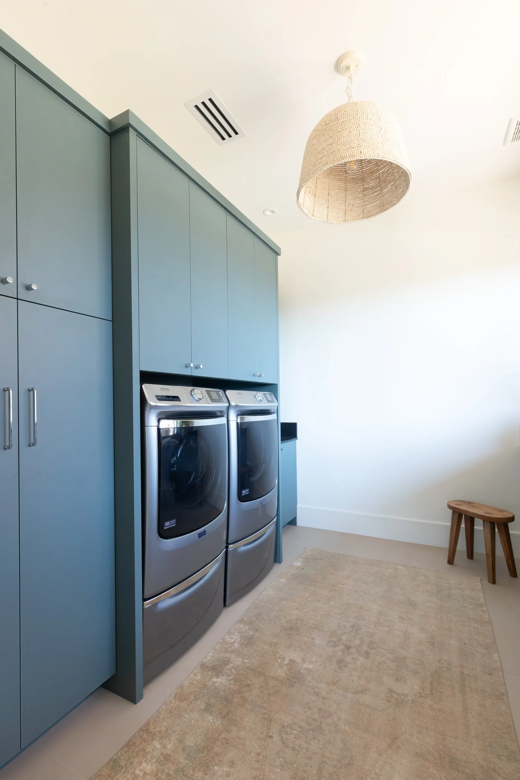 Modern Blue Laundry Room.jpg