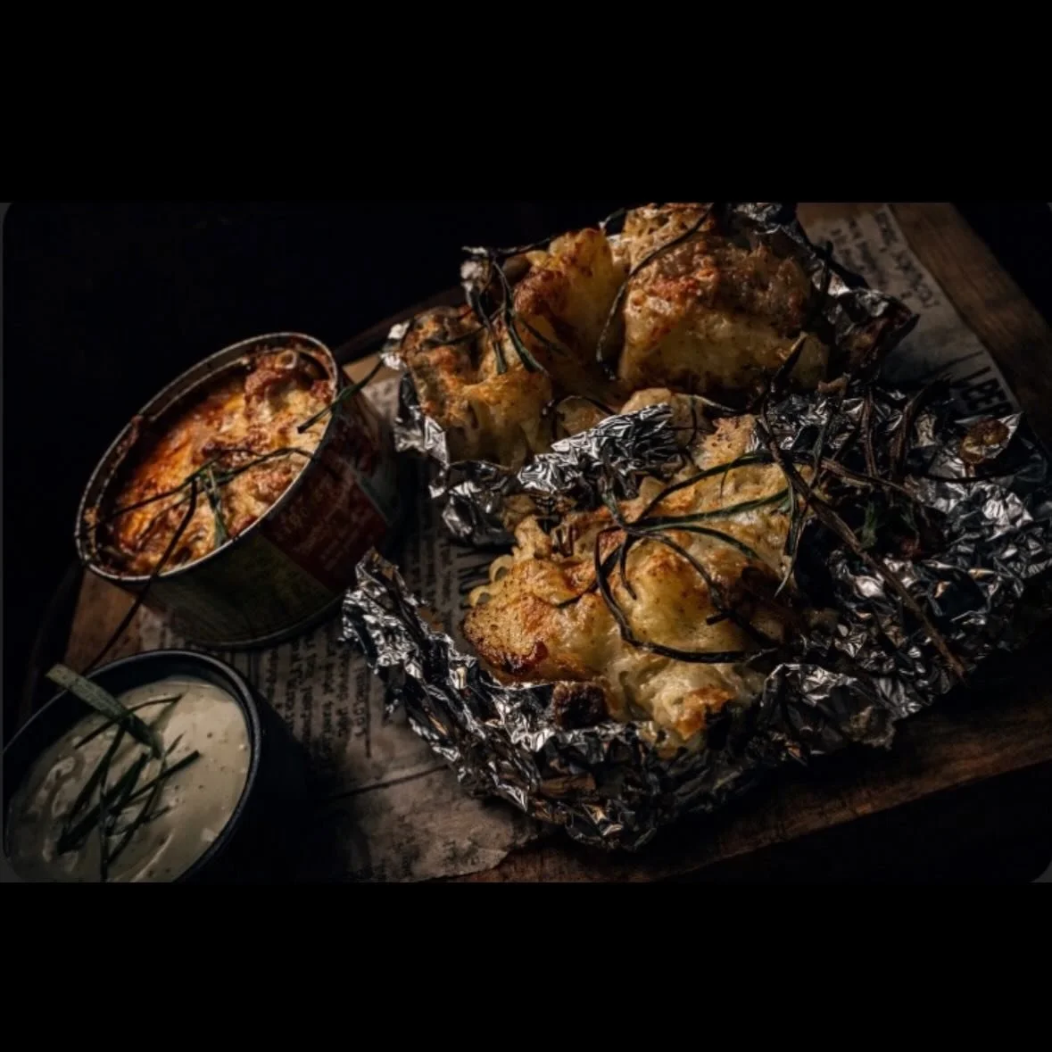 Summer&rsquo;s playing hard to get, so we&rsquo;re leaning in to  comfort.
Jacket potato, pulled chicken, beans &mdash; one of this week&rsquo;s specials and exactly what your stomach is calling for.