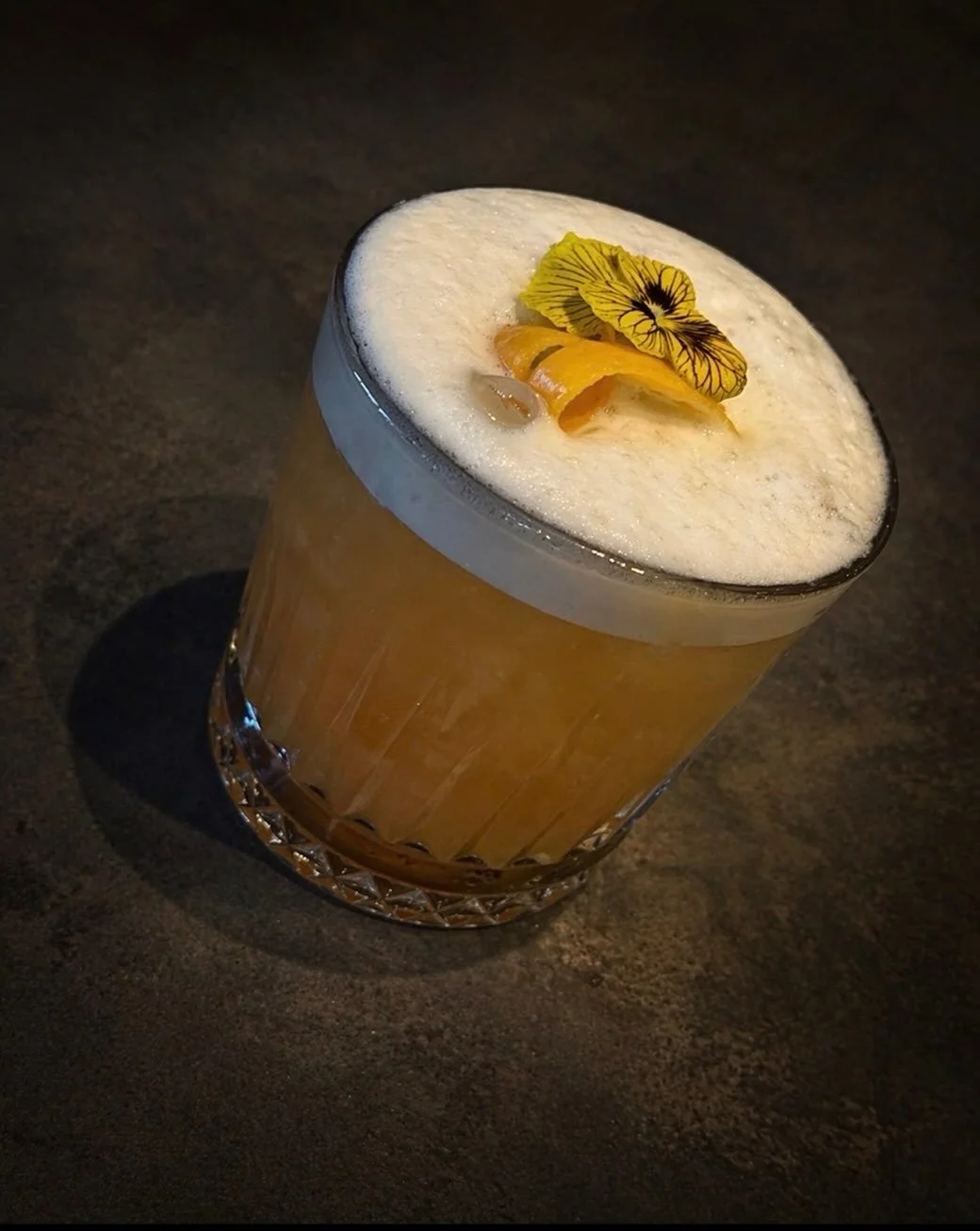 Cocktail of the Moment &mdash; Amaretto Sour

This one&rsquo;s taken off quicker than we expected, already shaking more than we planned.

Velvet-smooth amaretto, sharpened with fresh citrus and just enough bite to keep it honest. Easy drinking, hard 