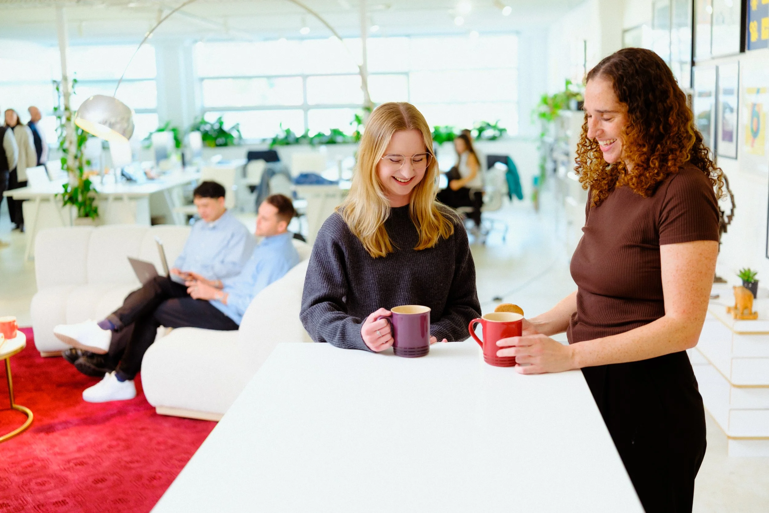 Collaborative workspace at Mindbox showing agnostic technology approach and quality culture"