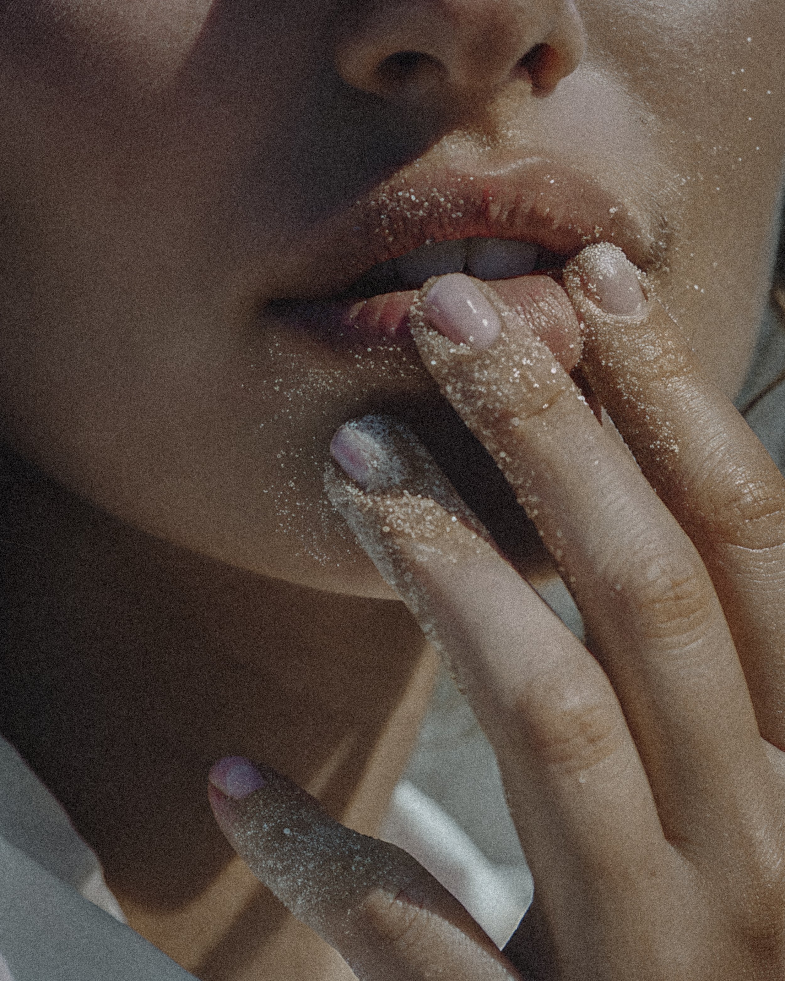 sandy_fingers_touching_lips_closeup.jpg