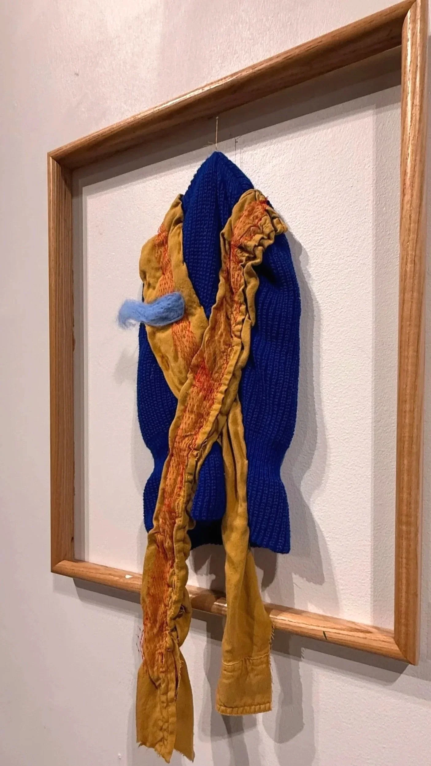 Installlation Image II
I chose you
2025
Nearly Lemon

blue knit mask, recycled fabric, thread and wool roving in floating frame
19.75” x 15.5”