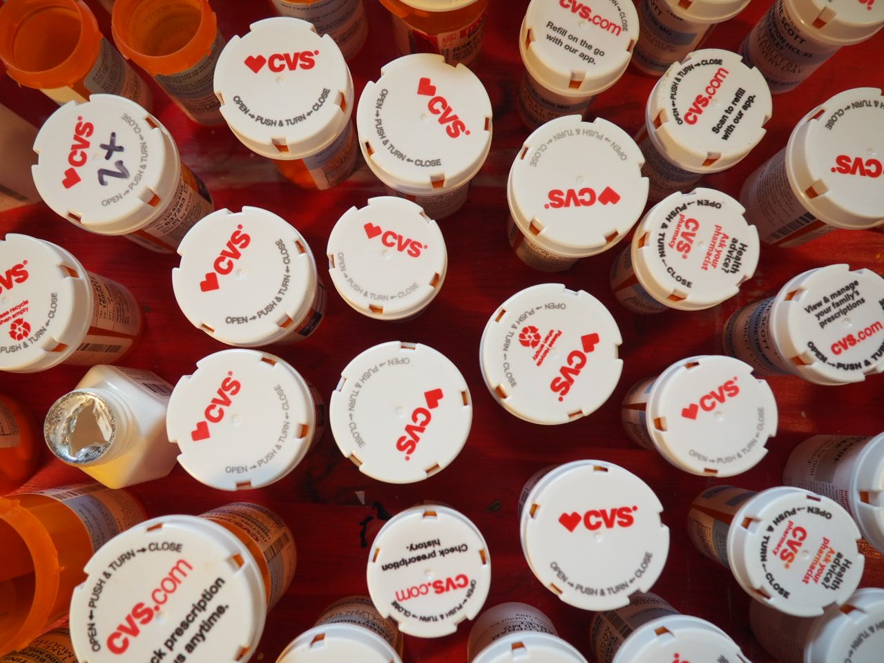 some pharmacy caps from cvs of leftover personal expired medication from decades of medical and psychiatric treatment