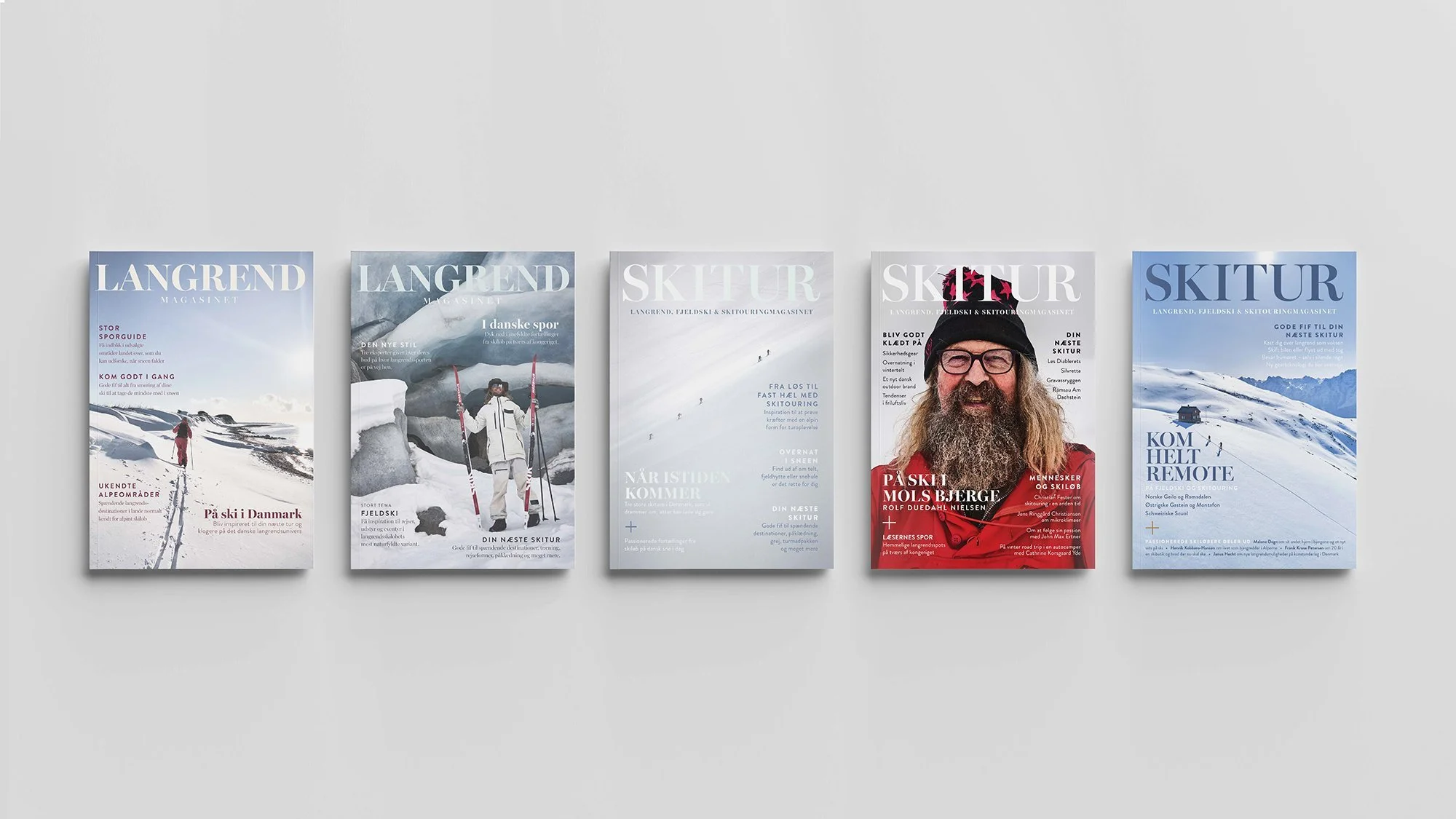 Cover pages of five magazines titled 'SKITUR' and 'LANGREND,' featuring snowy mountain landscapes, skiers, and a man with a beard wearing a red jacket and black hat.
