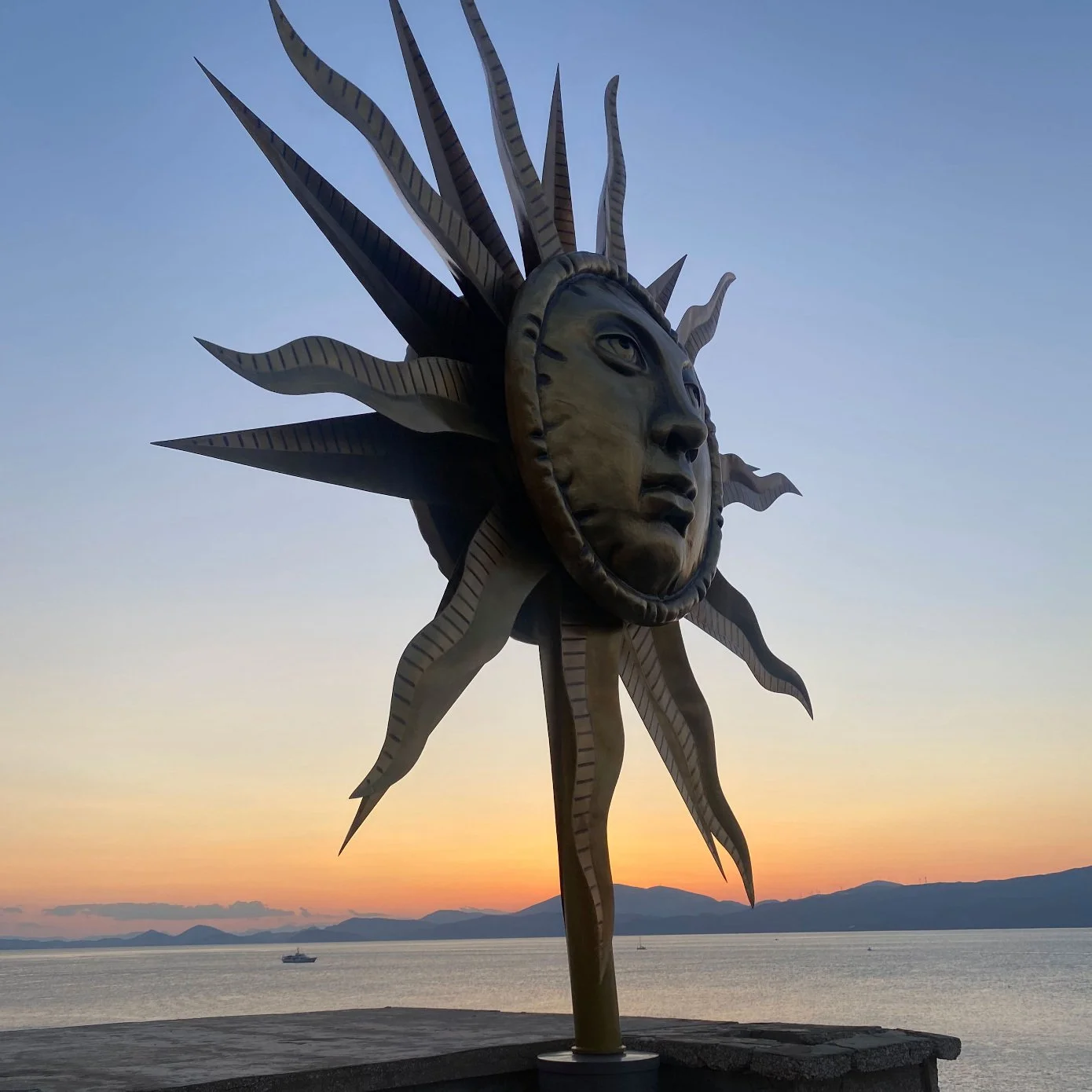 Jeff Loomis, an American musician, best known for his role as lead guitarist in the progressive metal band Nevermore made this sun sculpture on Hydra Island Greece. Jeff Koons had nothing to do with it