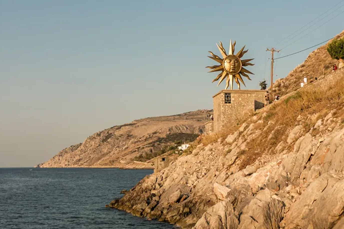 Jeff Loomis, an American musician, best known for his role as lead guitarist in the progressive metal band Nevermore made this sun sculpture on Hydra Island Greece. Jeff Koons had nothing to do with it