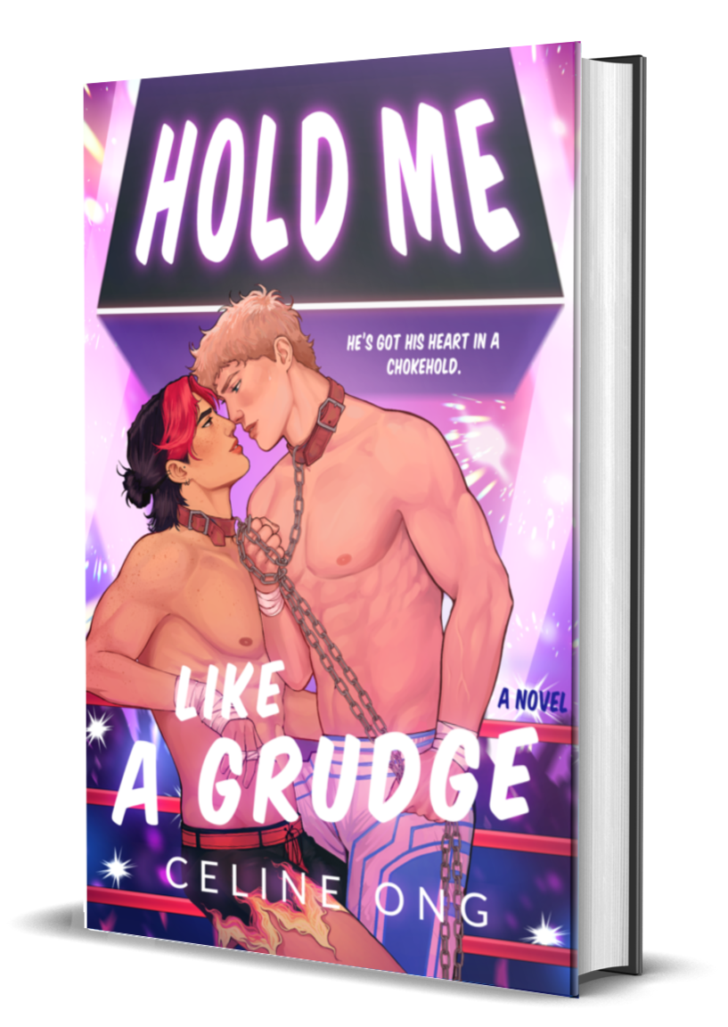 Book cover for the queer sports romance novel "Hold Me Like a Grudge" by Celine Ong featuring two shirtless men gazing at each other in a wrestling ring, one with red and black hair, the other with blond hair, connected by chains around their necks.
