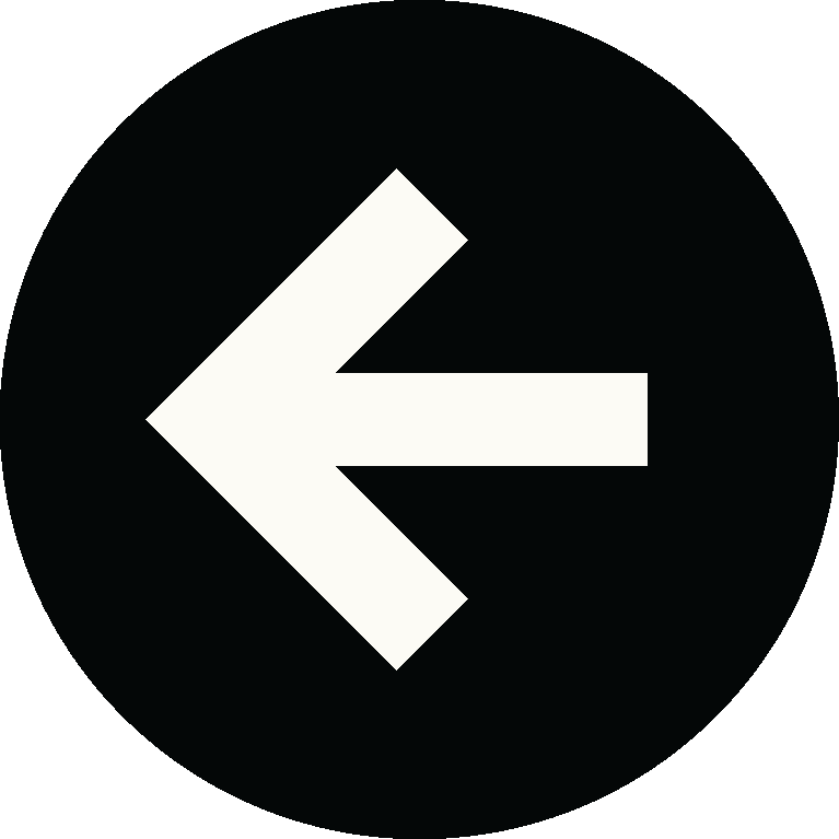 A black circular background with a white left-pointing arrow symbol.