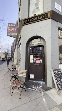 Logo featuring a large black oval and the words 'UNIQUE BEAUTY' with stylized letters 'U' and 'B' and small blue eyes inside the 'B'.