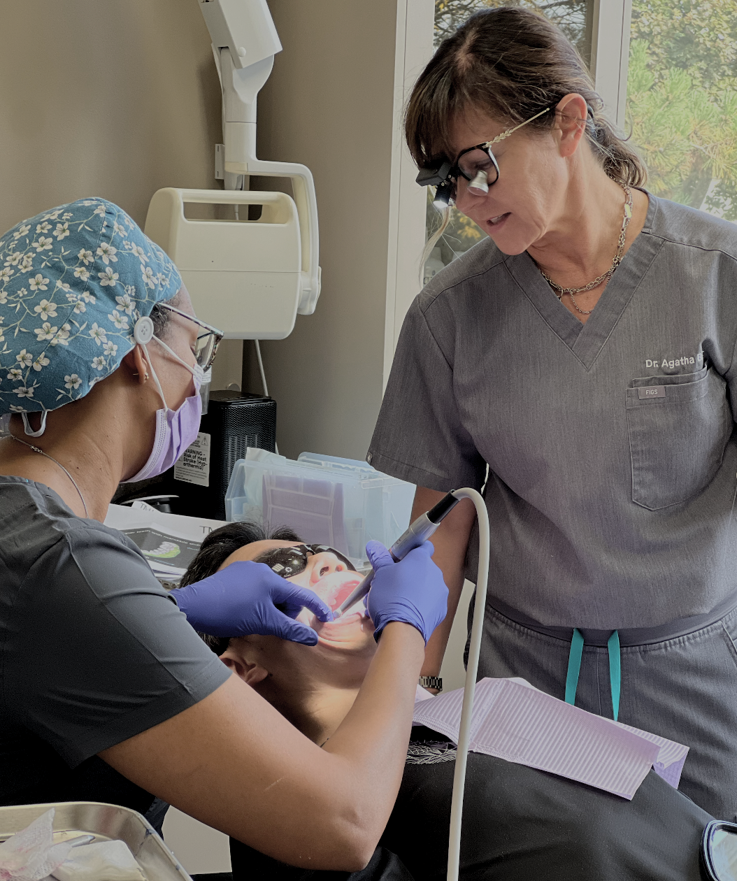 Dentist studying TMJ diagnosis and occlusion principles taught by Dr. Agatha Bis.