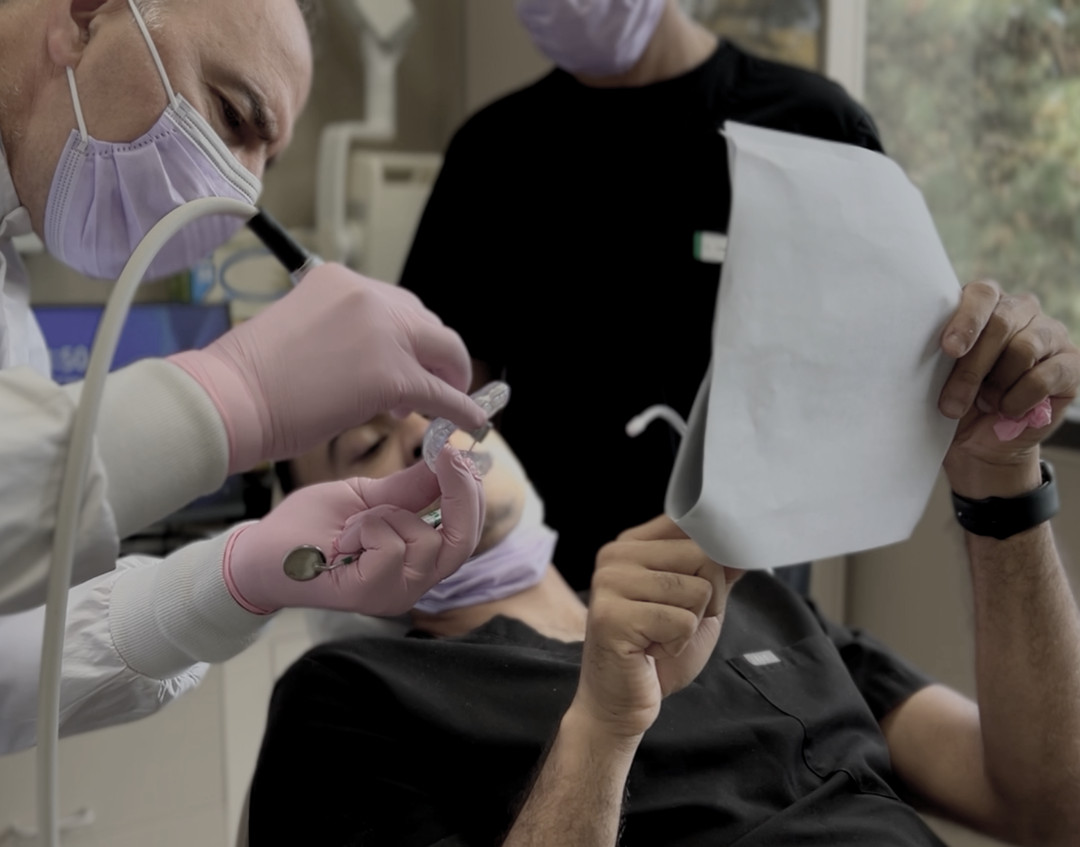 Small-group case review focused on occlusion, TMJ, and cosmetic dentistry led by Dr. Agatha Bis.