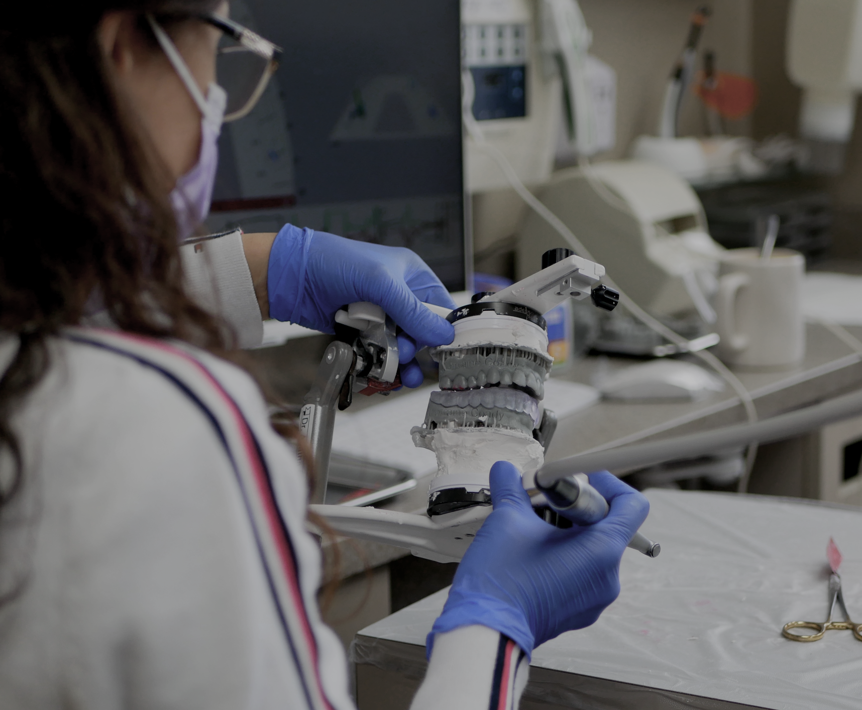 Occlusion-focused dental course image teaching how bite forces affect the temporomandibular joint and long-term restorative success. Dr. Agatha Bis
