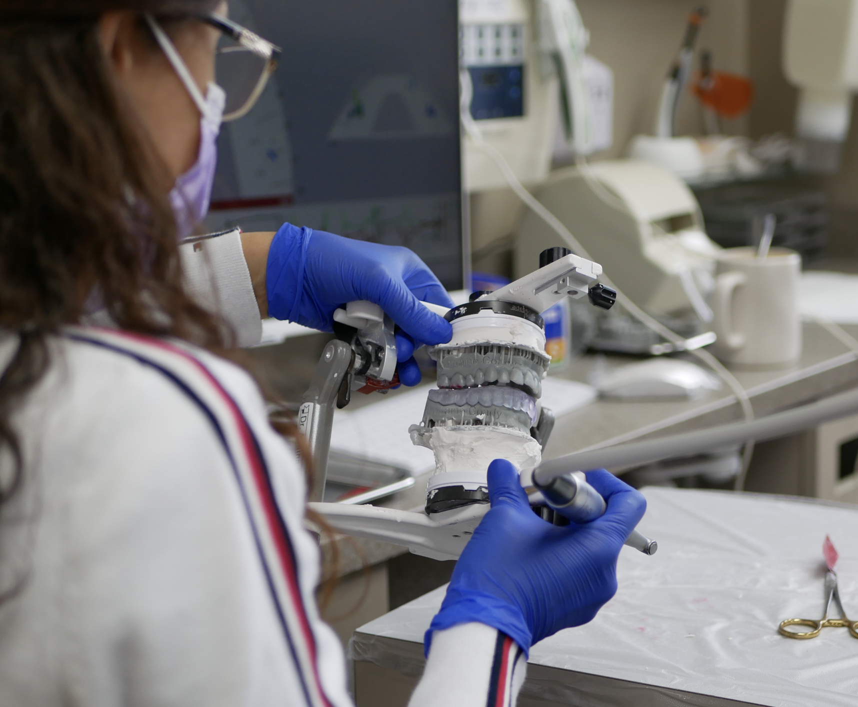 Occlusion-focused dental course image teaching how bite forces affect the temporomandibular joint and long-term restorative success. Dr. Agatha Bis
