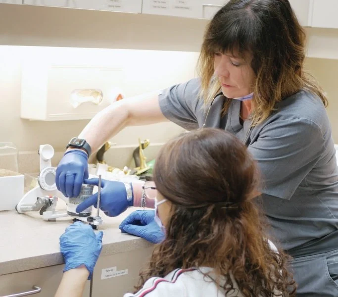 Dr. Agatha Bis teaching dentists during a TMD and TMJ dentistry training course, sharing clinical strategies for jaw alignment, occlusion, and patient-centered care
