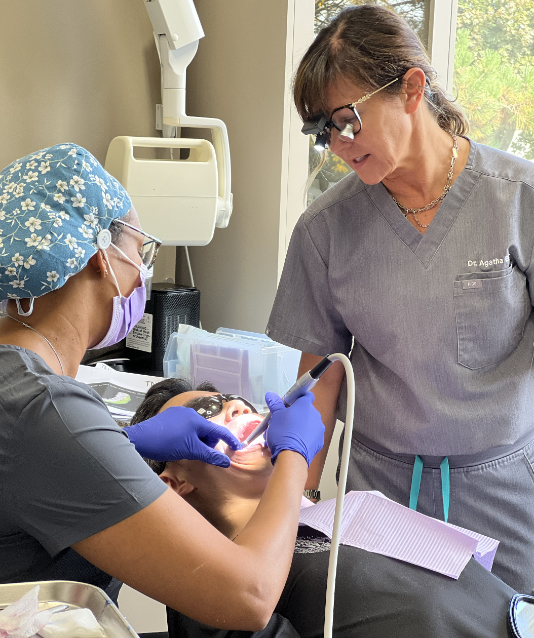 Dentist studying TMJ diagnosis and occlusion principles taught by Dr. Agatha Bis.