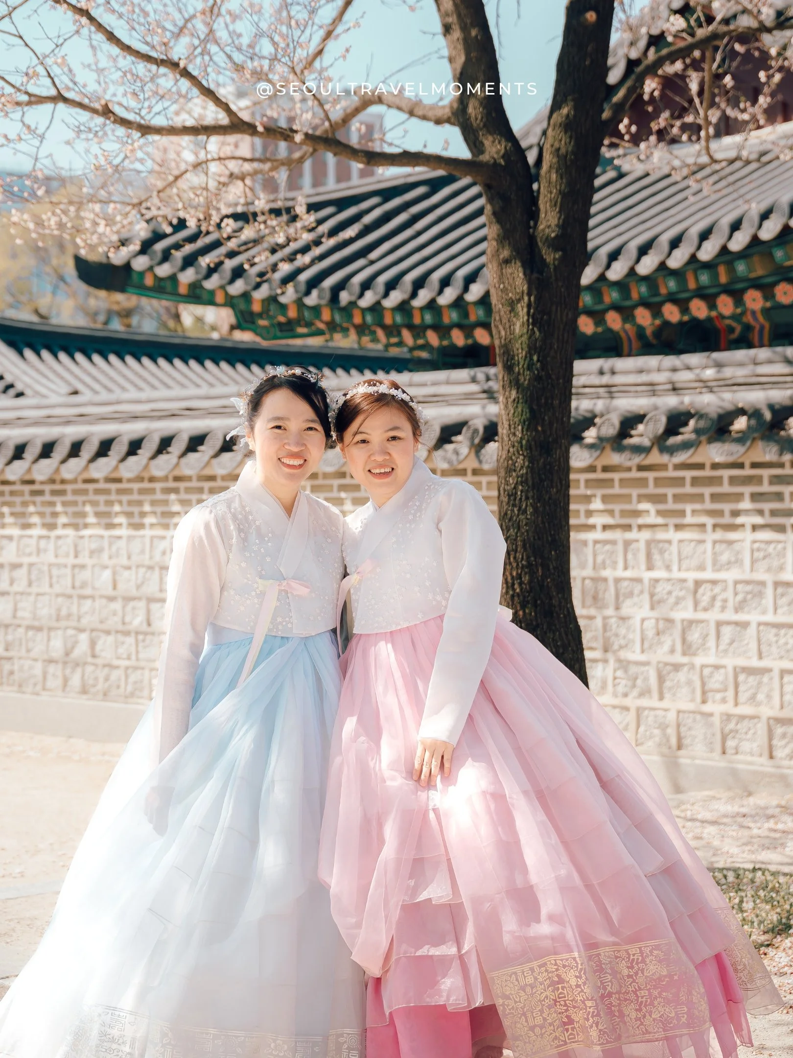 natural moments between friends wearing hanbok at changdeokgung palace seoul
