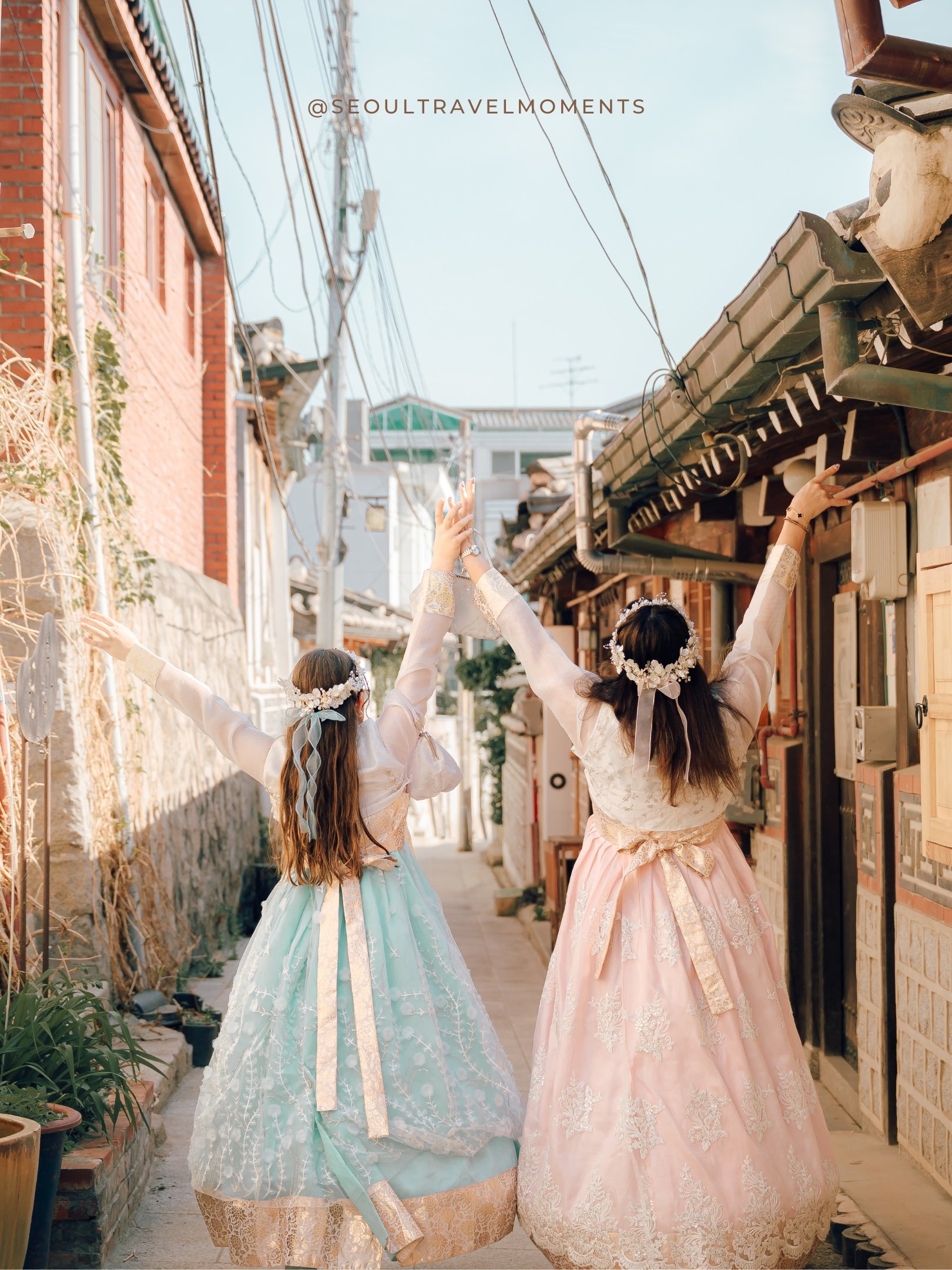 Traditional Korean hanbok family session in Bukchon with a mother and her two daughters